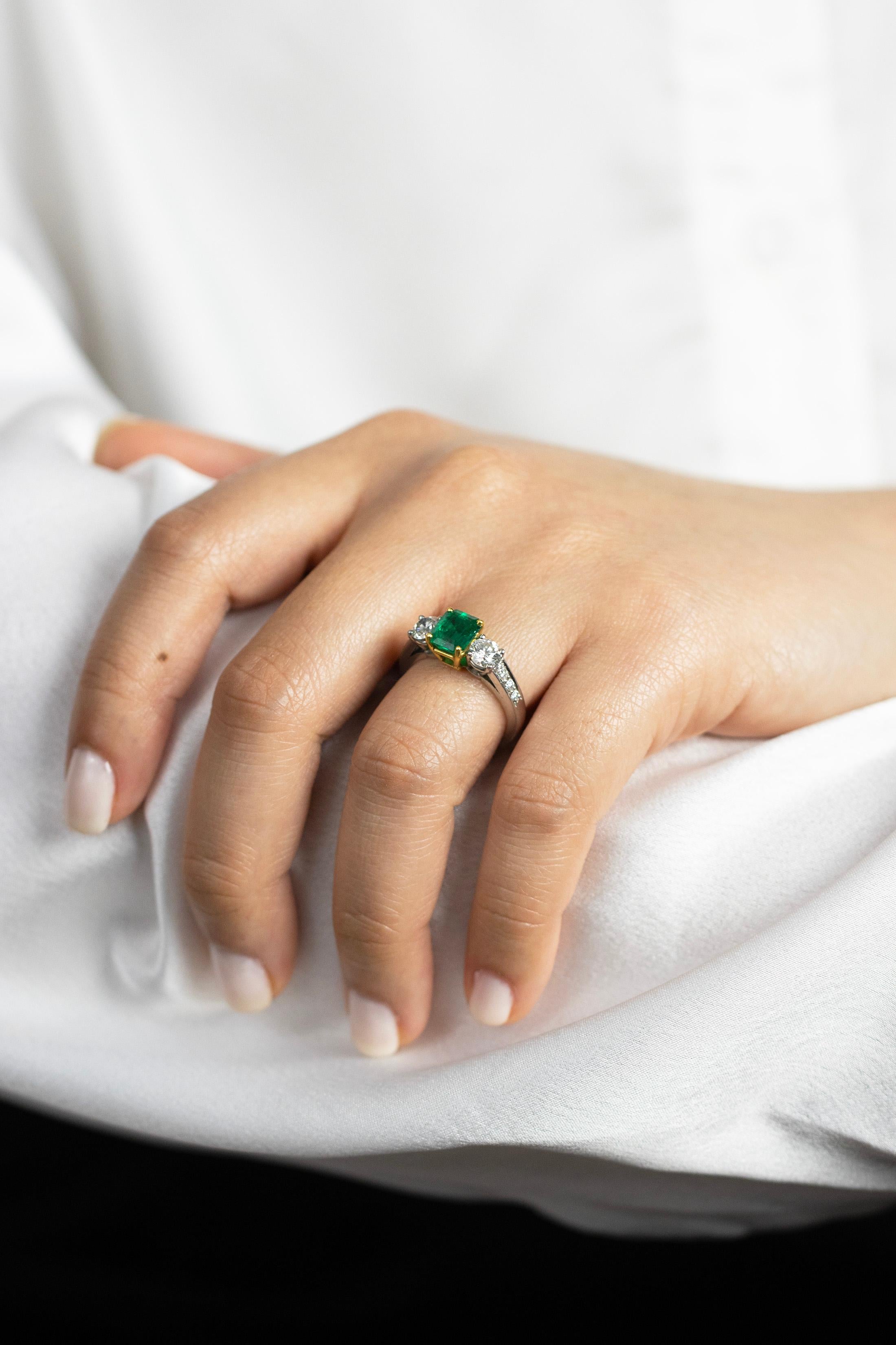 green emerald engagement rings