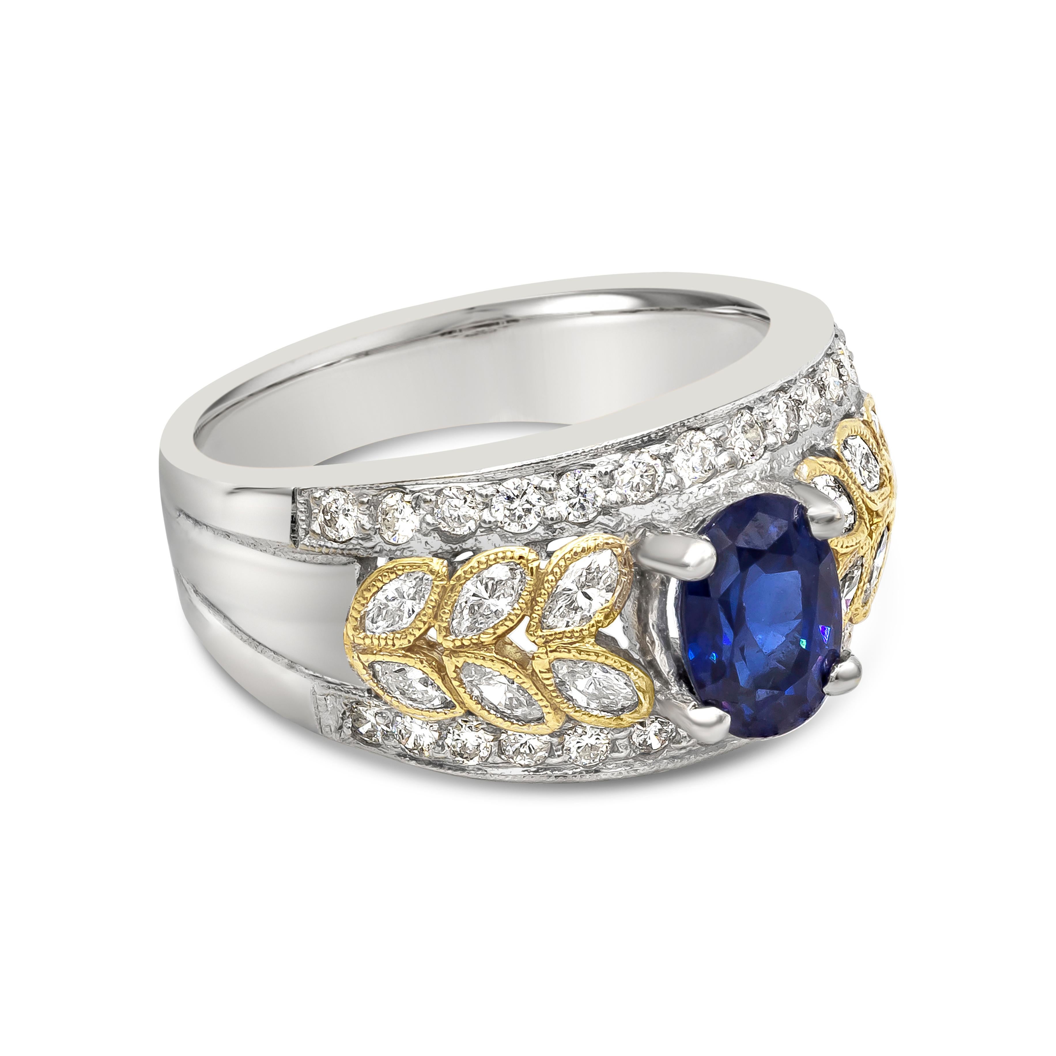 An appealing and charming fashion ring showcasing a single oval cut blue sapphire weighing 1.44 carats total, Set in a beautiful wide band accented with round and marquis cut diamonds weighing 0.88 carats total. Made in 18K White Gold, Size 7