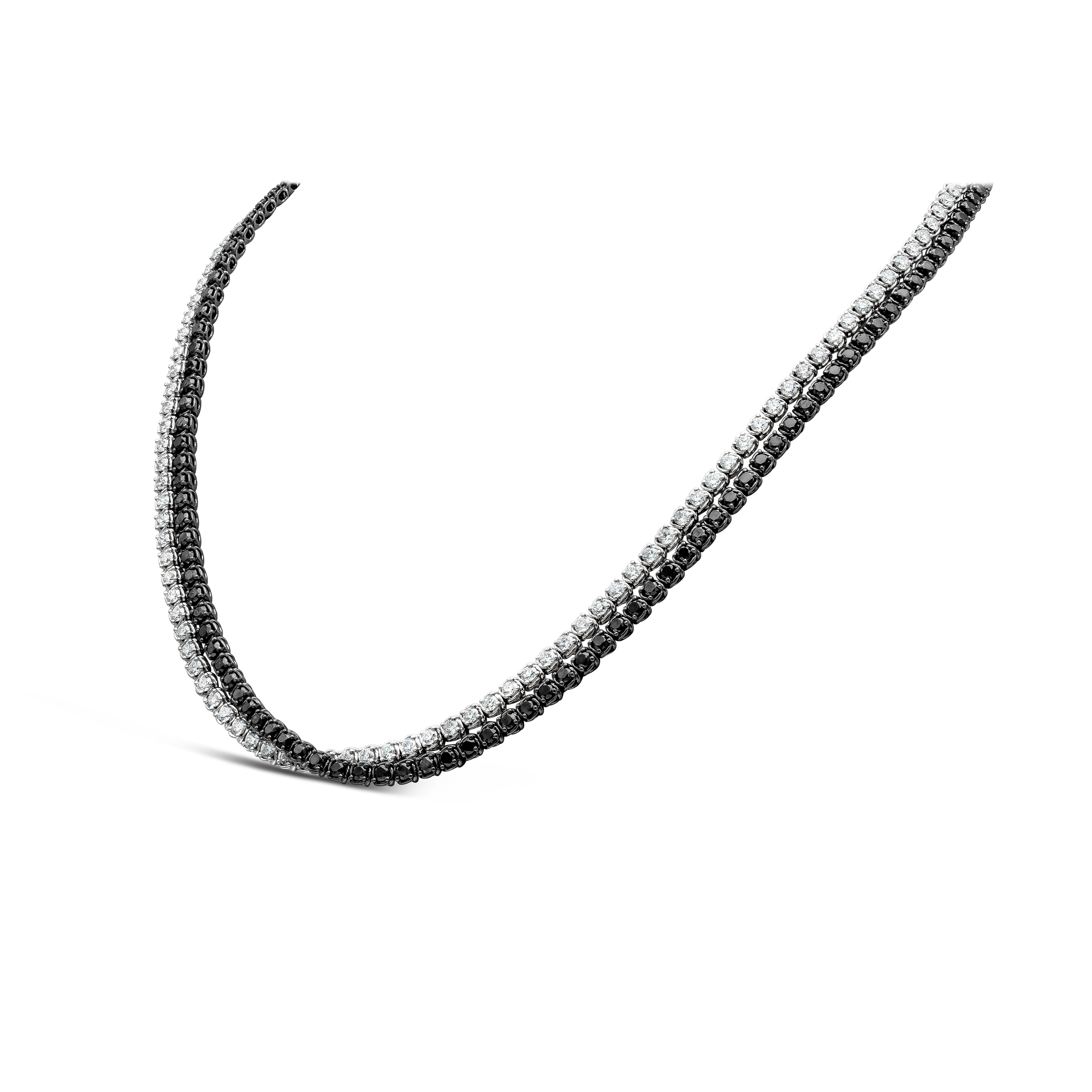 Ein modisches und elegantes schwarz-weißes Crossover-Collier, das 246 runde Brillanten präsentiert. Schwarze Diamanten wiegen insgesamt 8,01 Karat und weiße Diamanten wiegen insgesamt 6,45 Karat mit F Farbe und VS-SI1 in Reinheit. Hergestellt mit
