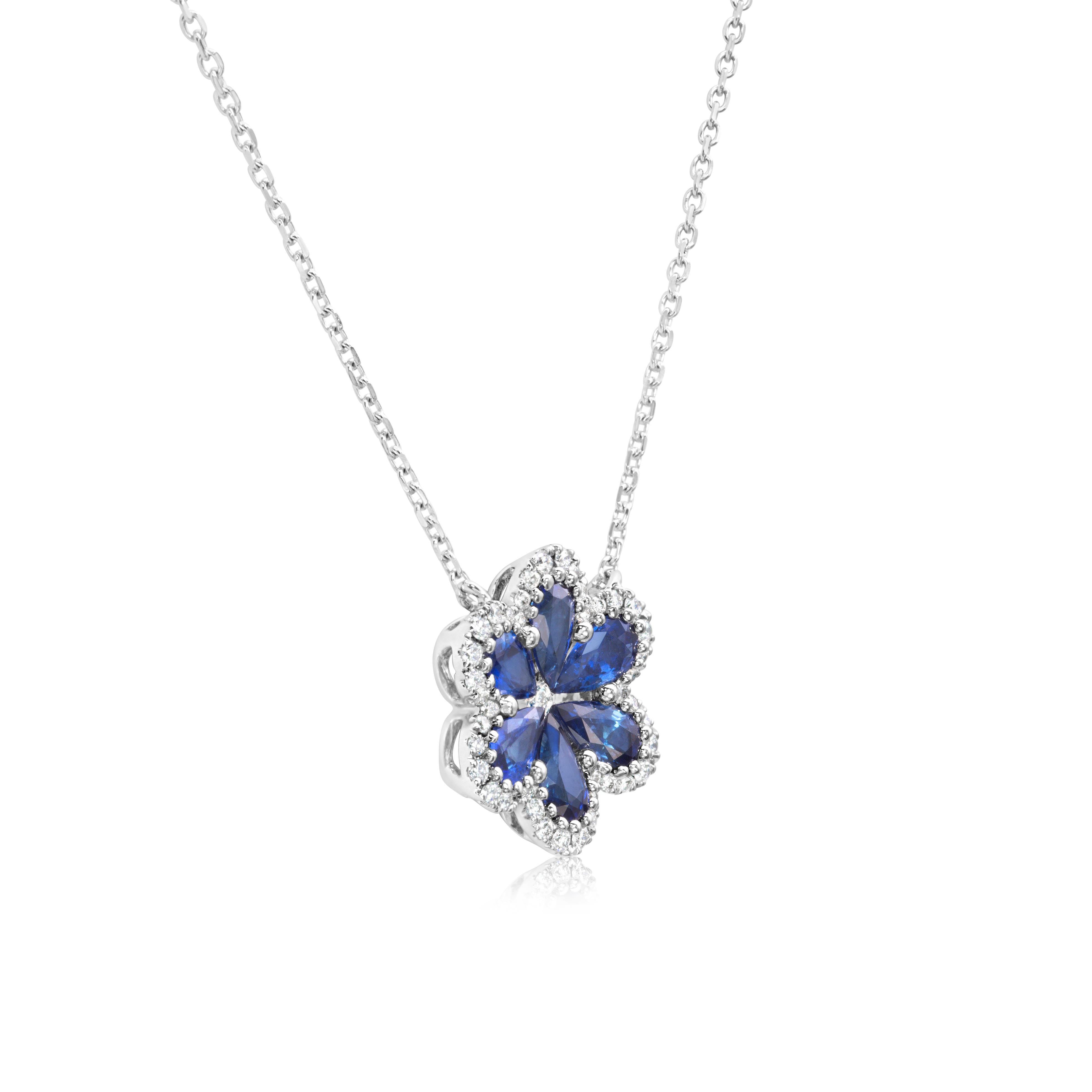 Una bella collana con ciondolo, con sei zaffiri a forma di pera del peso totale di 1,29 carati, incastonati su un motivo floreale. Accentuato da un'aureola di diamanti taglio rotondo per un peso totale di 0,18 carati, incastonati in una montatura a