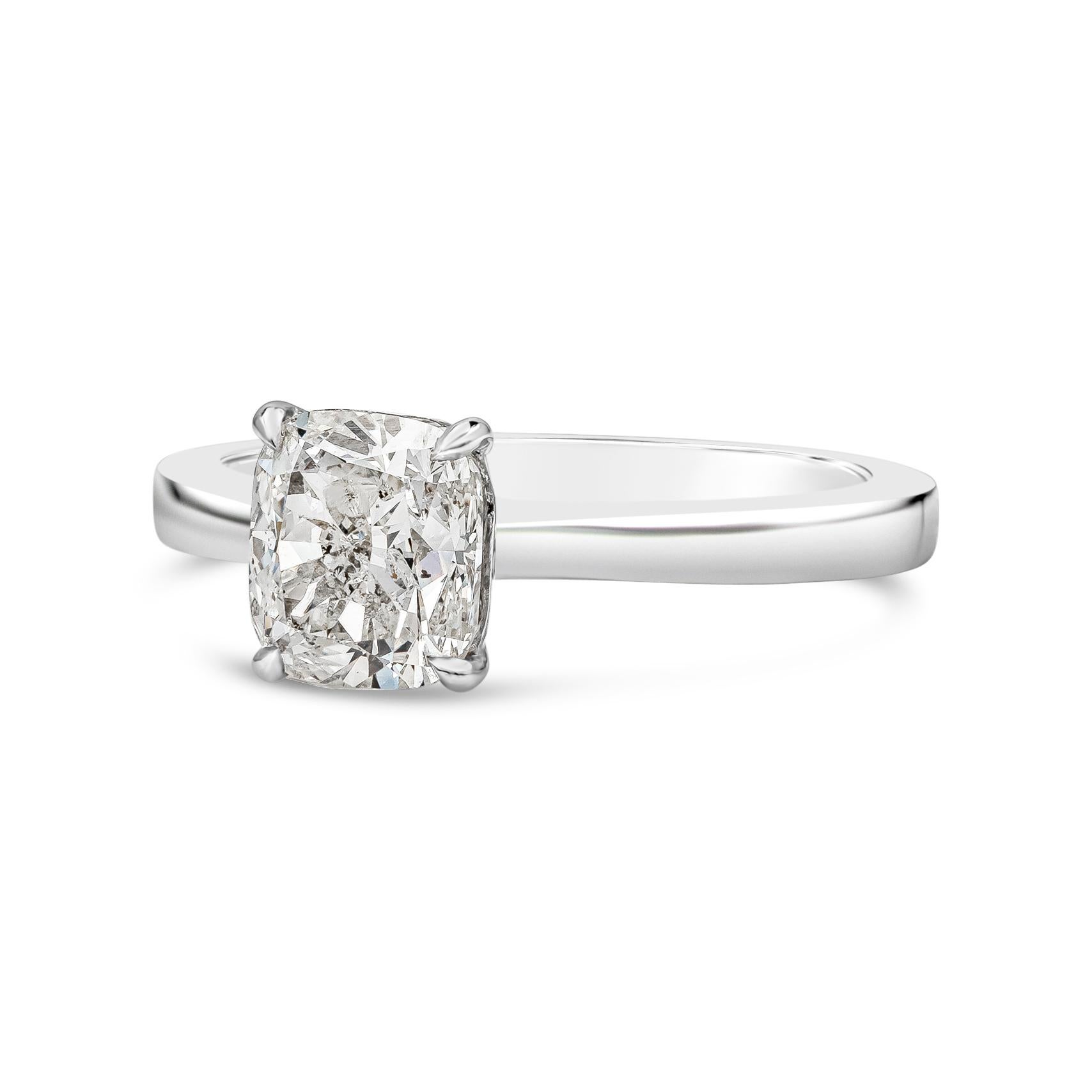 A simple and timeless solitaire design in polished platinum showcasing a 1.53 carat cushion cut diamond. Set in a traditional 4 prong basket on a tapered and comfort fit shank. Size 6.5 US (Sizable upon request).

Style available in different price