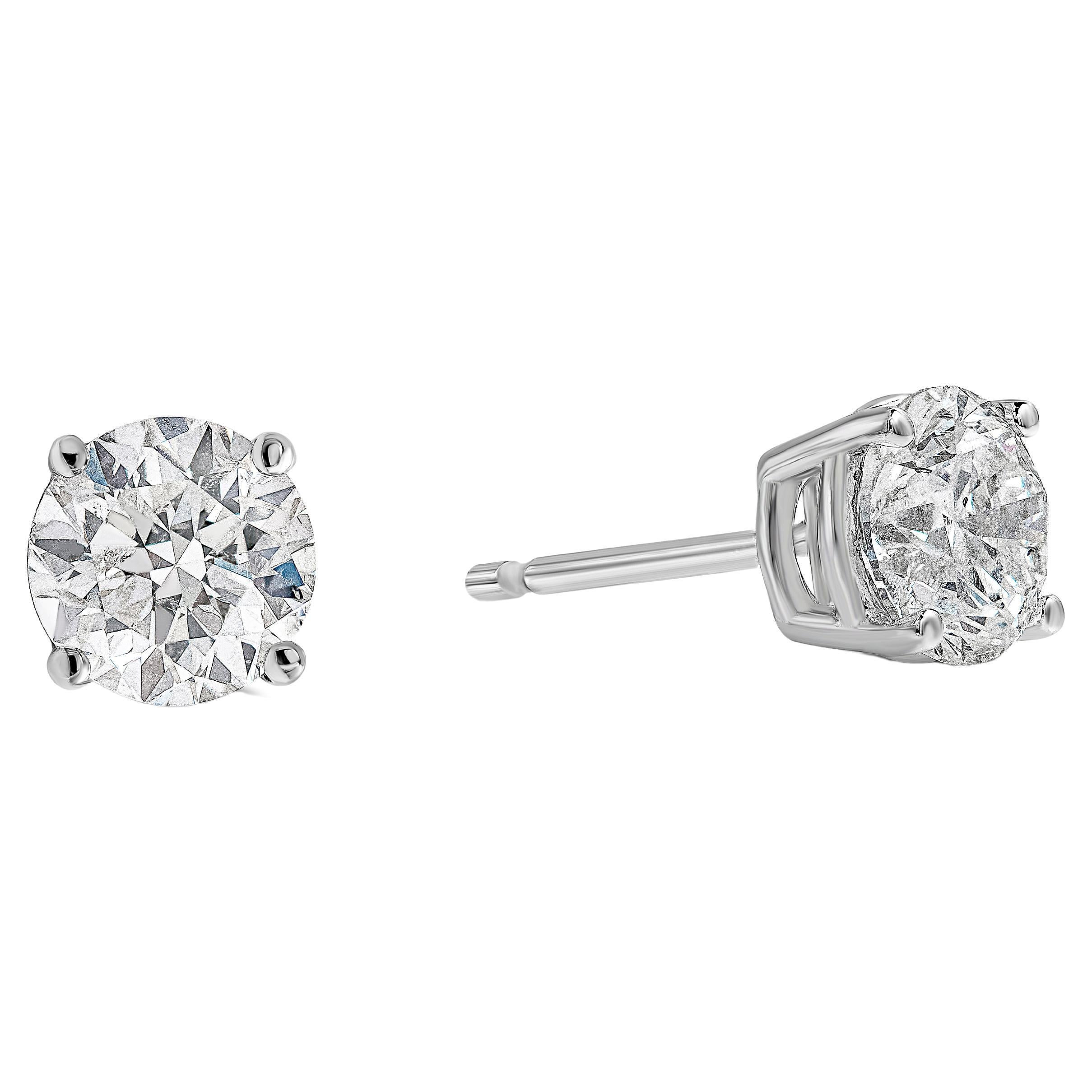 A classic pair of earrings showcasing two brilliant round diamonds, each set in a single 18k white gold four prong basket setting. Diamonds weigh 1.63 carats total and are approximately F-G color, SI3 in clarity.

Style available in different price