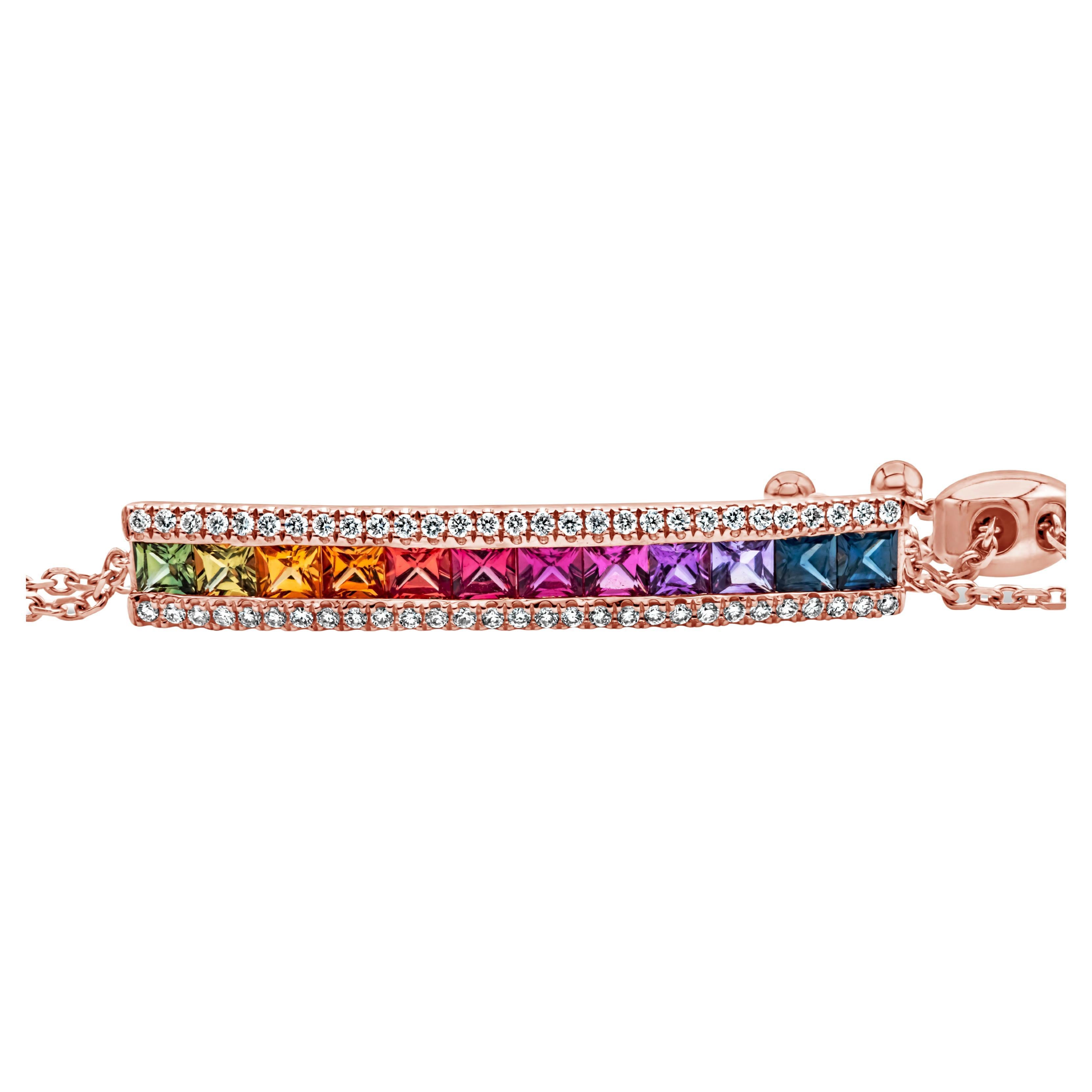 This fashionable bracelet has 12 multi color sapphires weighing 1.70 carats, M-C in Color and VS in Clarity. Flanked by a row of 58 round brilliant diamonds that weigh at 0.28 carats total, G Color and SI in Clarity. Adjustable slider clasp for