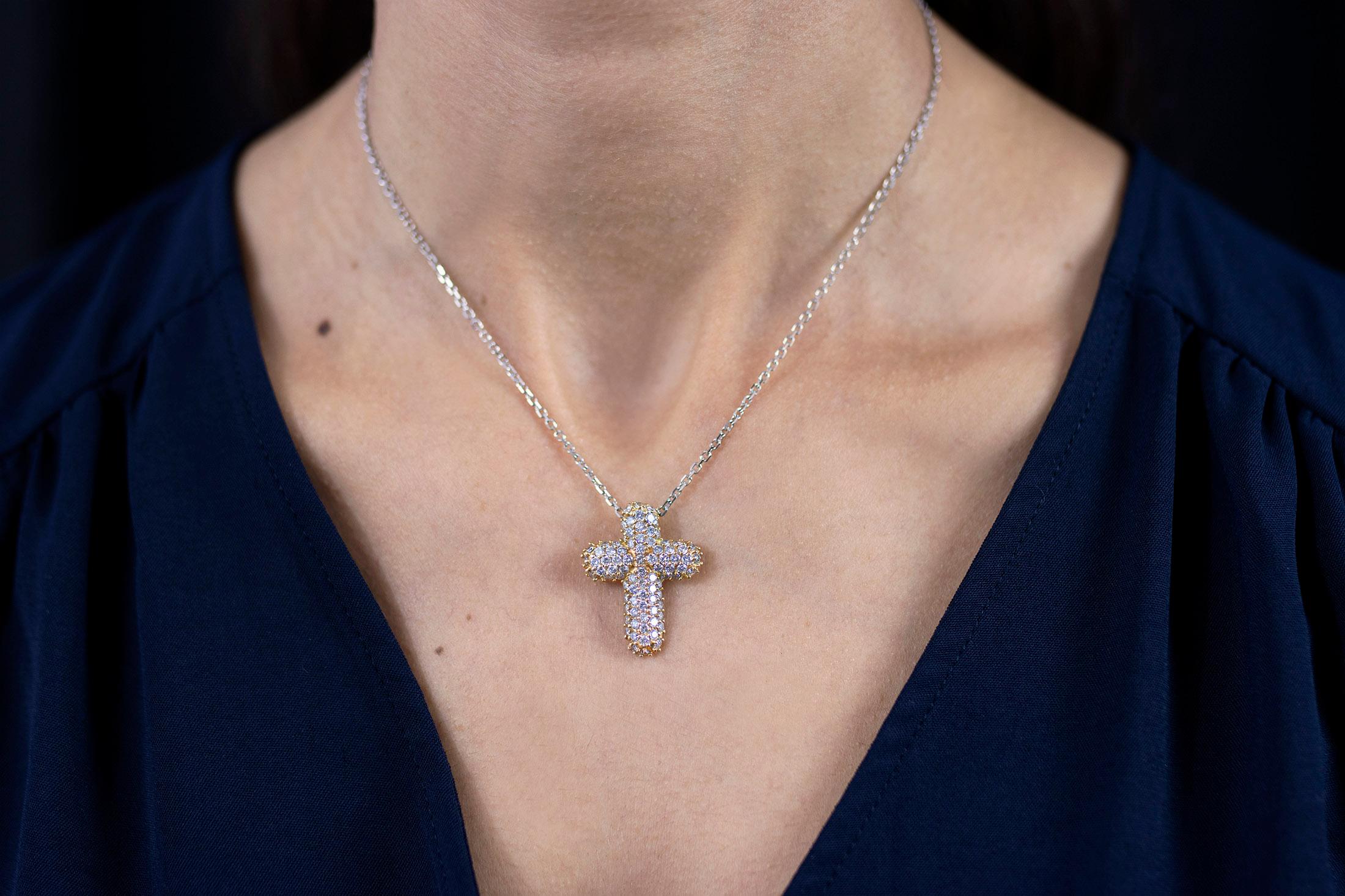A unique pendant showcasing a dome shaped cross set with round brilliant diamonds weighing 1.70 carats total. Made with 14K Yellow Gold. Suspended in 18K White Gold chain. 18 inches in Length. 

Roman Malakov is a custom house, specializing in