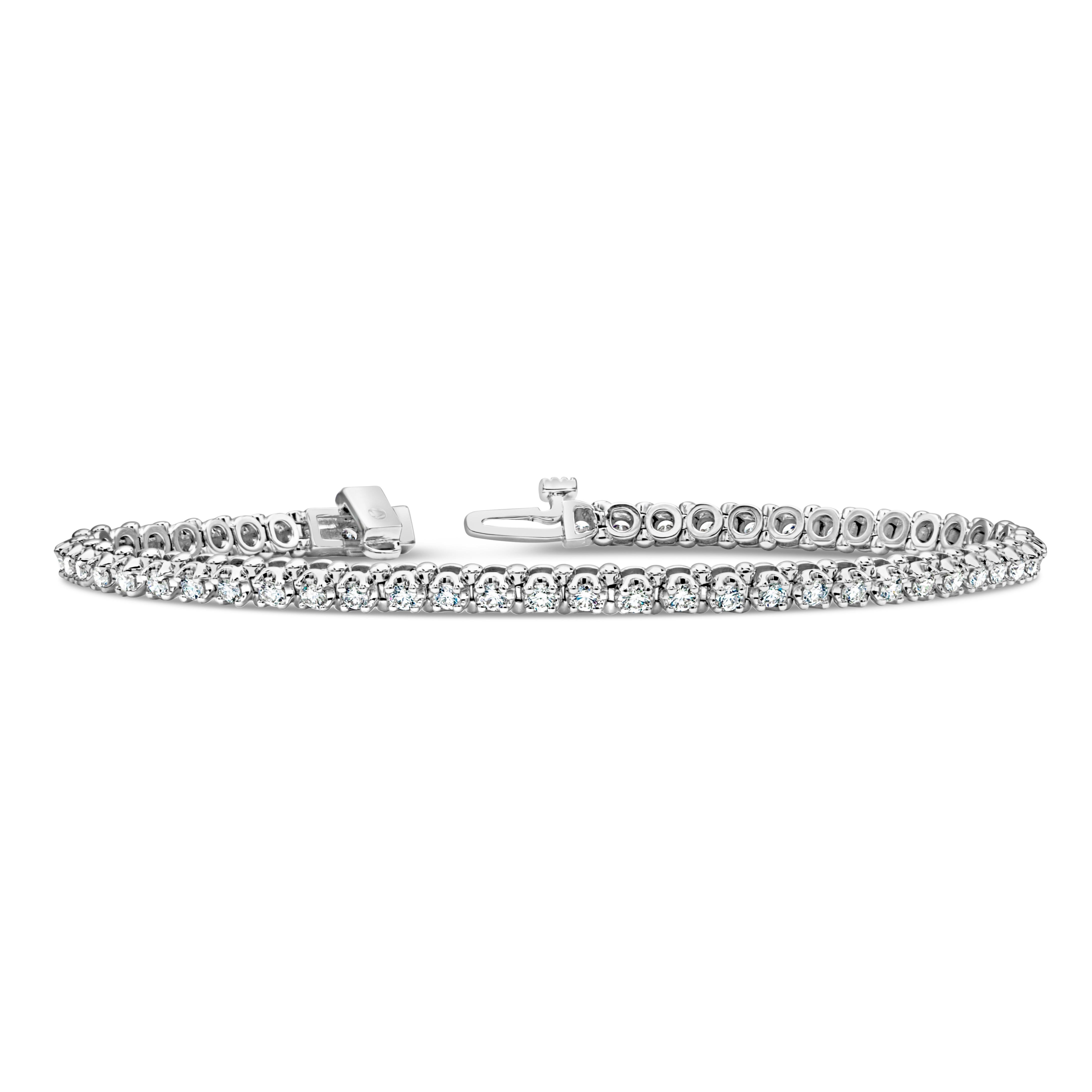 A classic tennis bracelet style, showcasing 55 round brilliant cut diamonds weighing 1.73 carats total with F color and VS2 clarity. Set on 14K white gold, 2 mm in width and 7 inches in length.

Roman Malakov is a custom house, specializing in