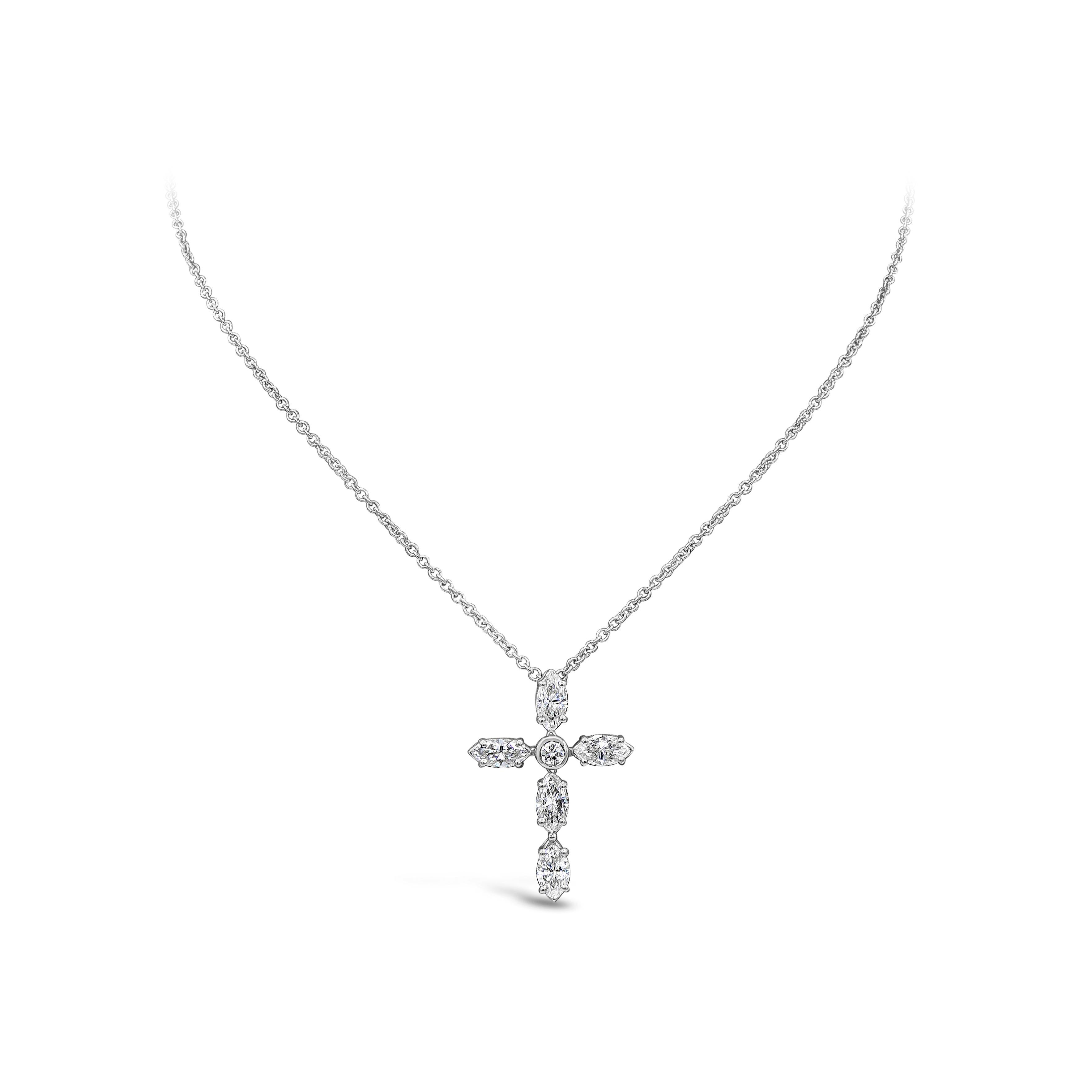 A simple and unique pendant necklace showcasing marquise cut diamonds set in a cross design with a round diamond center. Diamonds weigh 1.77 carats total. Set in a 14k white gold mounting. Suspended on an adjustable 18 inch white gold chain.

Style