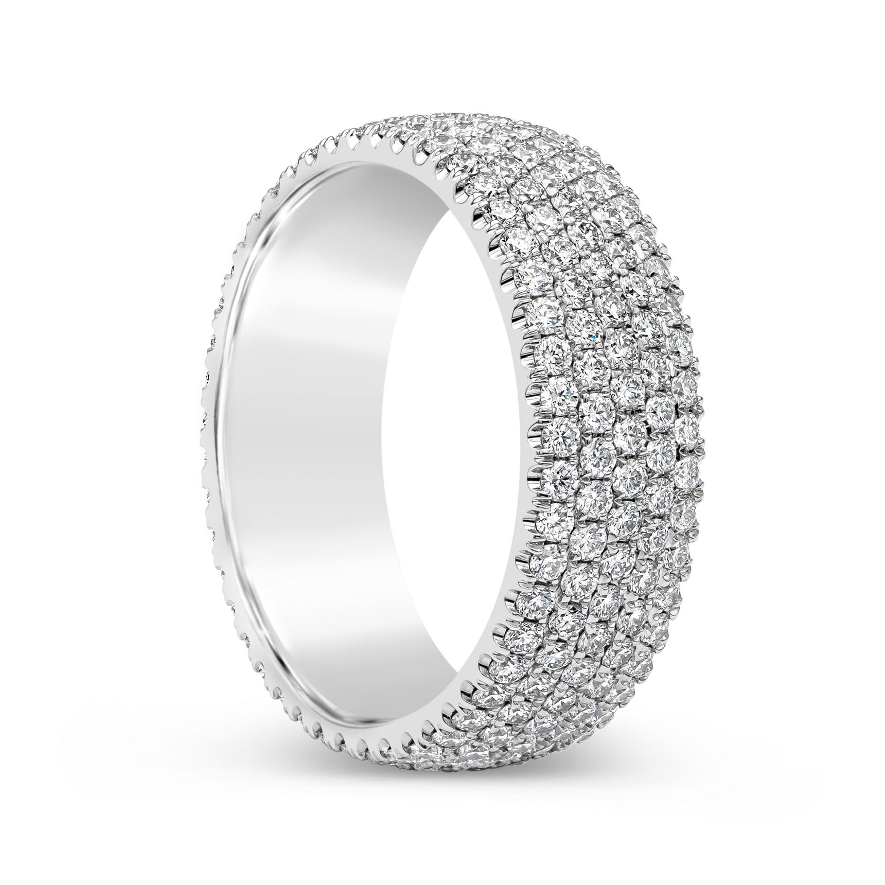 A brilliant piece of jewelry showcasing a cluster of round brilliant diamonds, micro-pave set in a wide 18k white gold mounting. Diamonds weigh 1.78 carats and are approximately F color, VS-SI clarity. Size 6 US.

Style available in different price