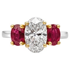 Vintage Roman Malakov 1.81 Carats Oval Cut Ruby and Diamond Three Stone Engagement Ring