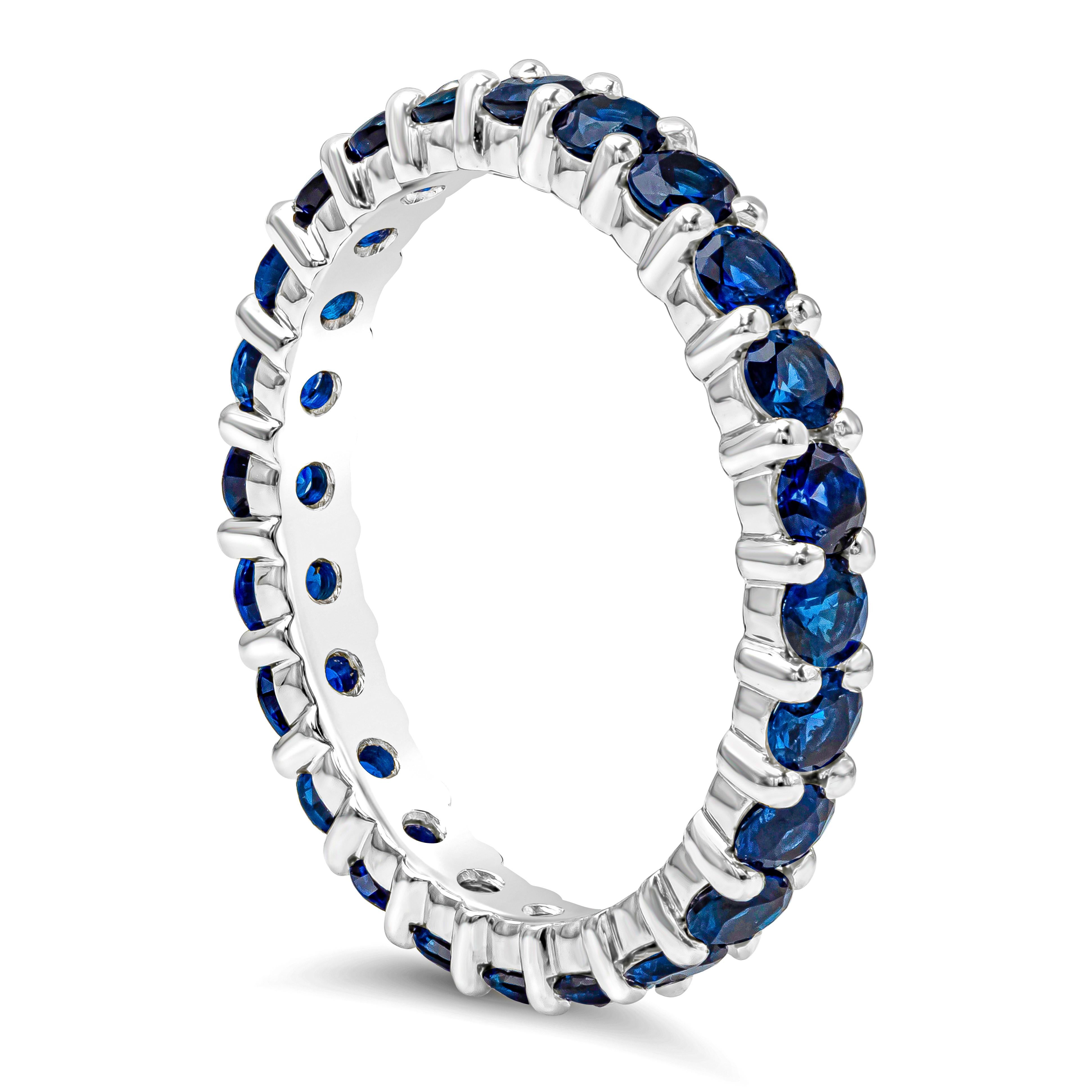 A beautiful and stackable wedding band showcasing a row of color-rich blue sapphires weighing 1.91 carats total and VS in clarity, set in a shared-prong setting, Made in 18K White Gold and Size 6 US resizable upon request.

Style available in