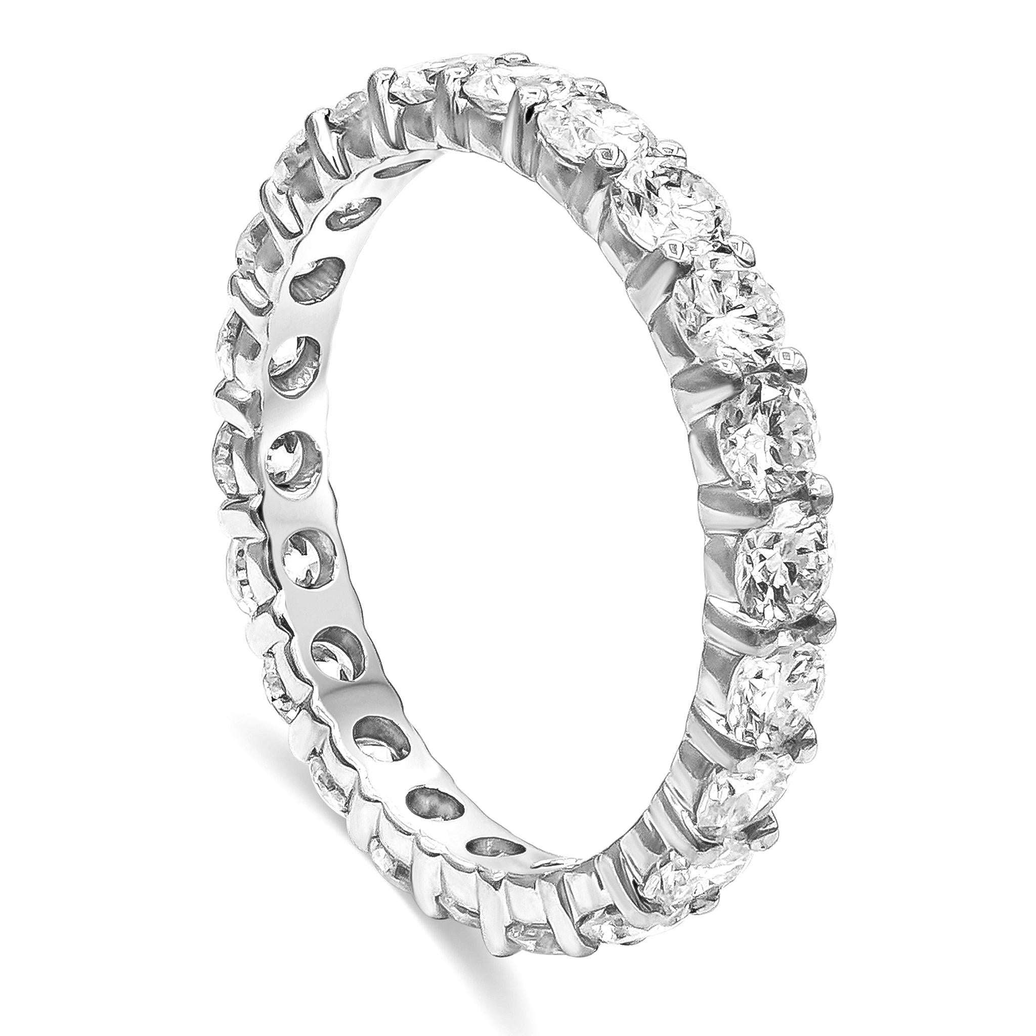 A classic eternity wedding band style showcasing a row of round brilliant diamonds weighing 1.92 carats total, G-H Color and VS in Clarity. Made with 18K White Gold. Size 6 US.

Roman Malakov is a custom house, specializing in creating anything you
