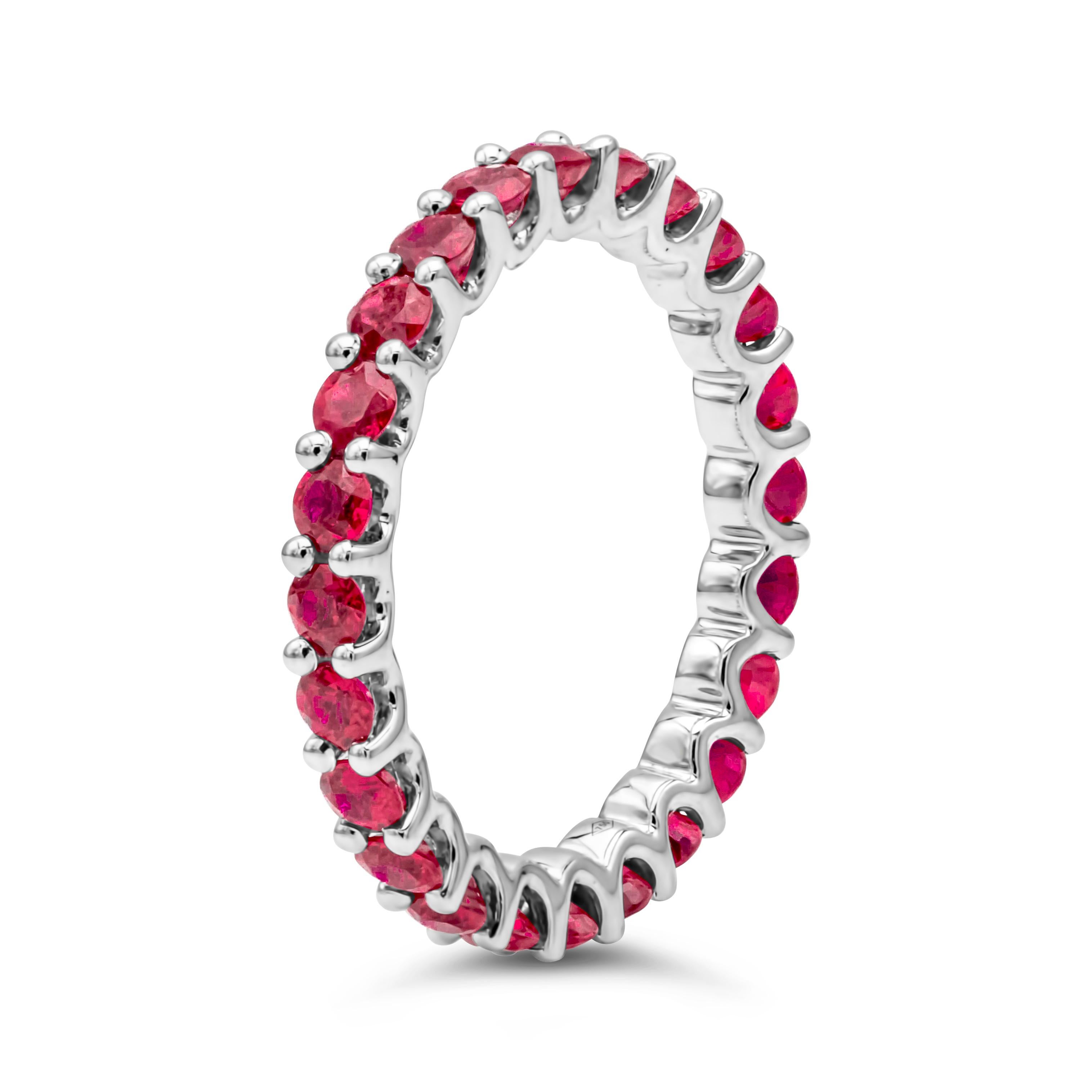 A unique take to the timeless eternity wedding band style showcases a 24 color-rich round cut rubies weighing 1.99 carats total, set in a classic shared prong setting. Finely made in 18K white gold. Size 6.5 US resizable upon request.

Style