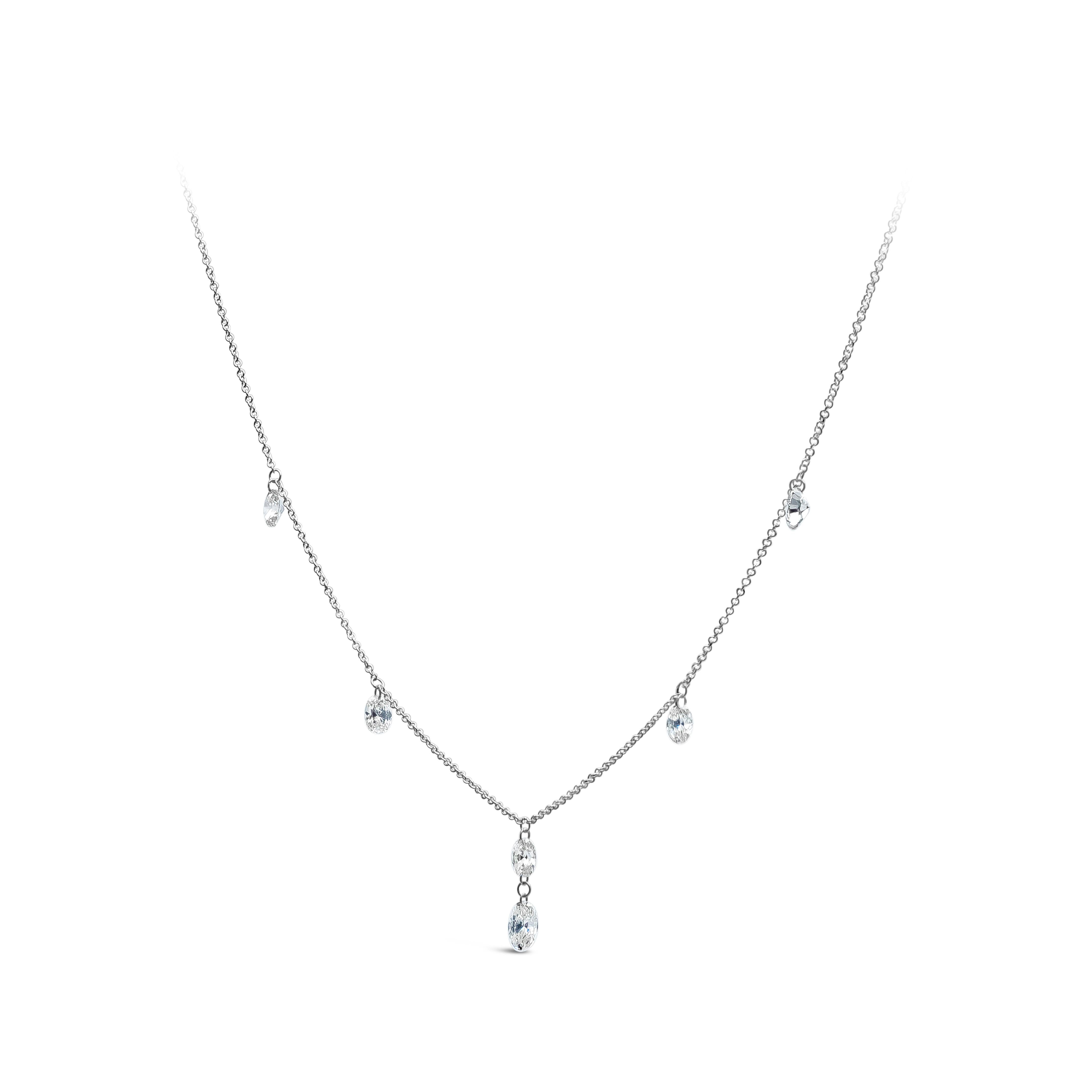 A unique and chic fashion necklace showcasing 2.01 carat total made with 6 pieces of oval cut brilliant diamonds, H-I Color, VS-SI in Clarity, single drilled and attached by 18K White Gold chain. 18 inches in Length, adjustable chain. 

Style