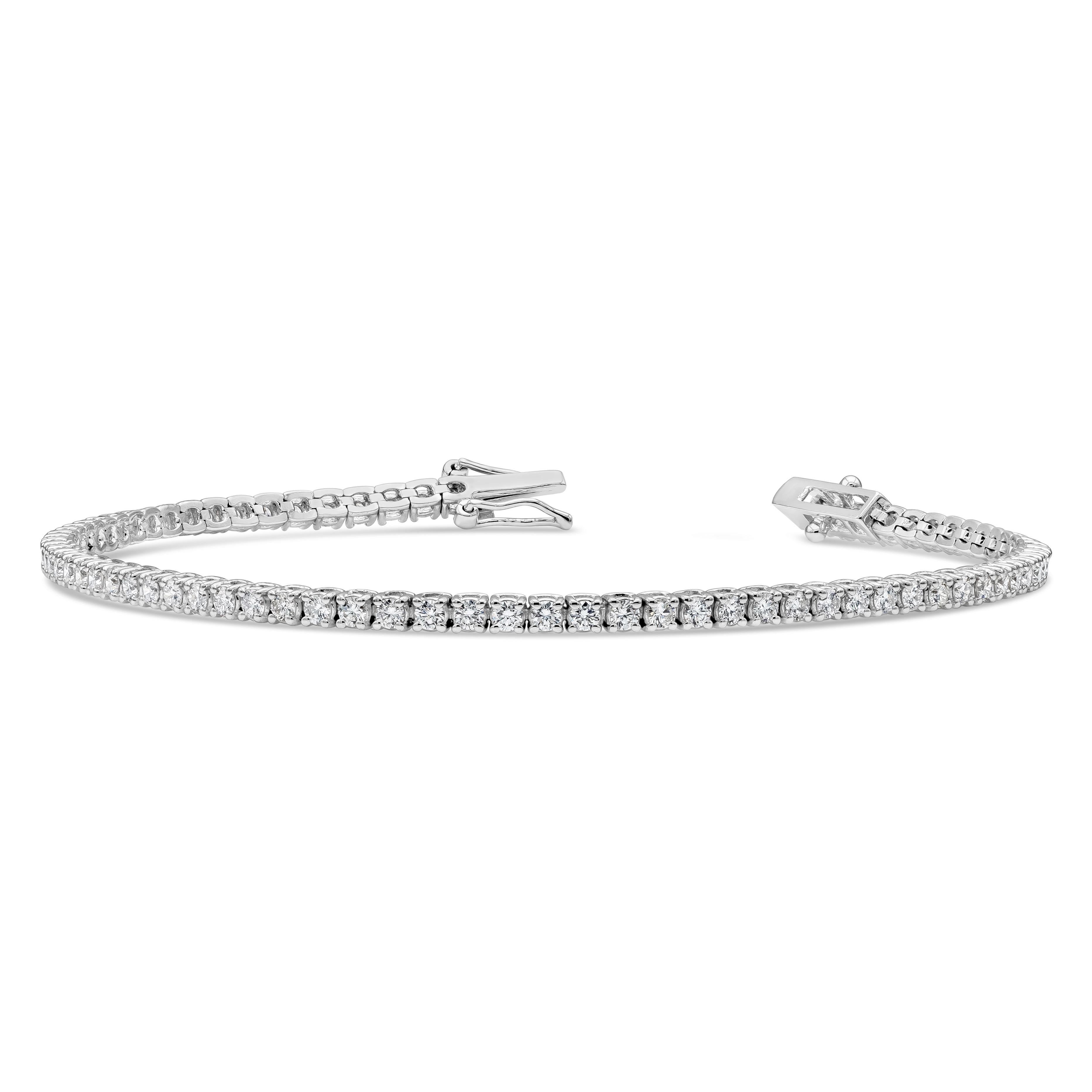 A classic tennis bracelet style showcasing 75 round brilliant diamonds weighing 2.06 carats total, F color and VS-SI in clarity. 7 inches in length. Made with 18K White Gold

Roman Malakov is a custom house, specializing in creating anything you can