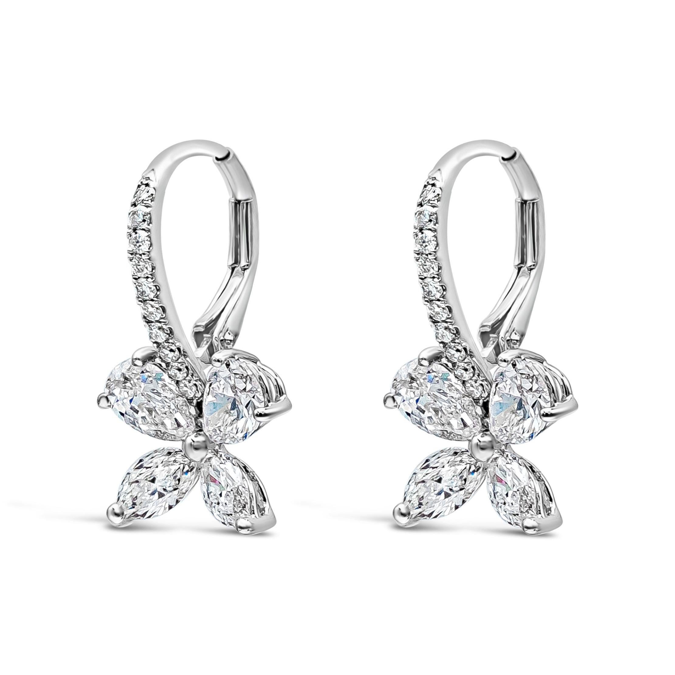 Unique style drop earrings showcasing mixed-shape diamonds weighing 2.06 carats total. Set in an elegant flower setting, Made with 18K White Gold.

Style available in different price ranges. Prices are based on your selection. Please contact us for