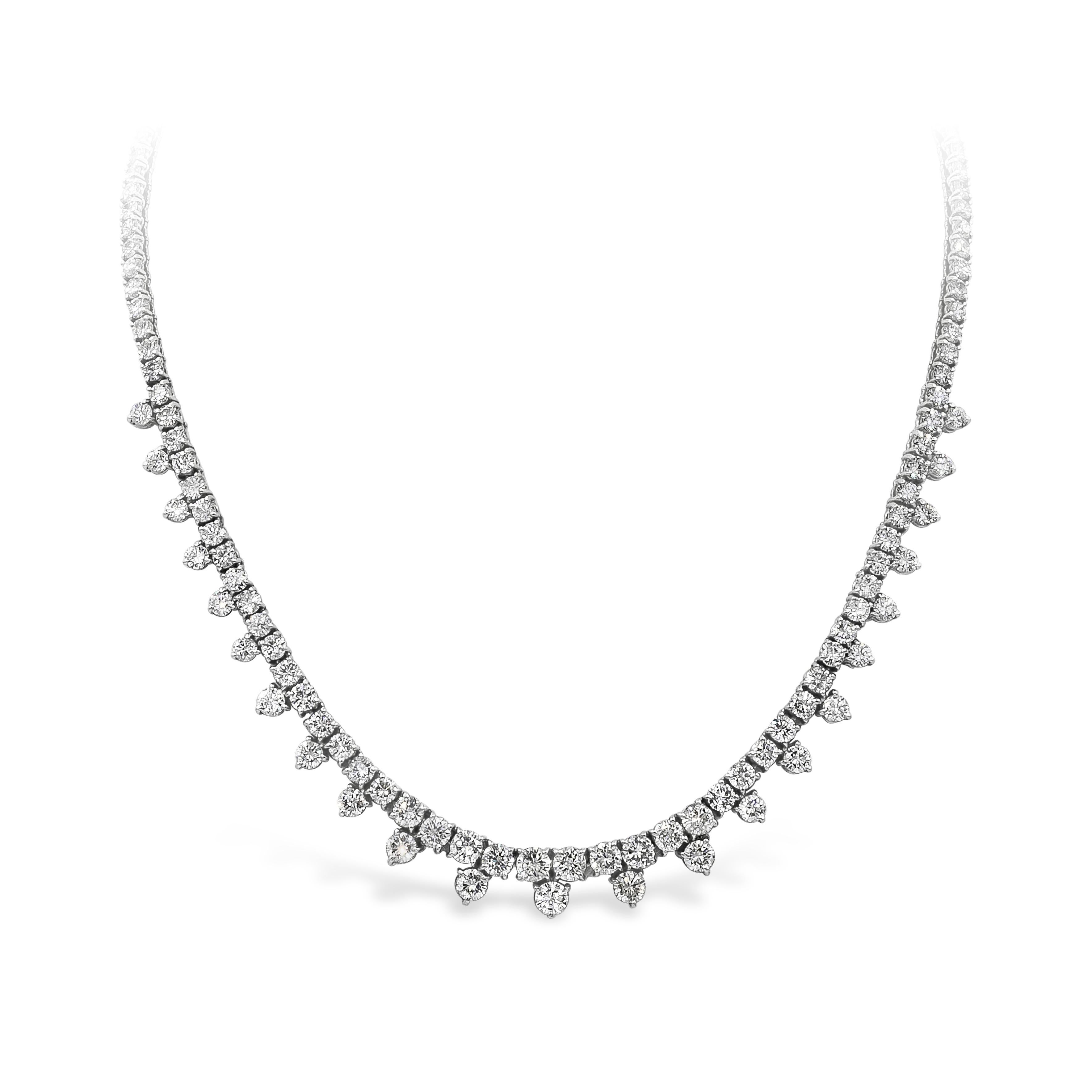 Elegantly made diamond necklace showcasing 158 round brilliant diamonds weighing 20.74 carats total, accented with evenly spaced round diamond and finely made in platinum. 16 inches in length.

Roman Malakov is a custom house, specializing in