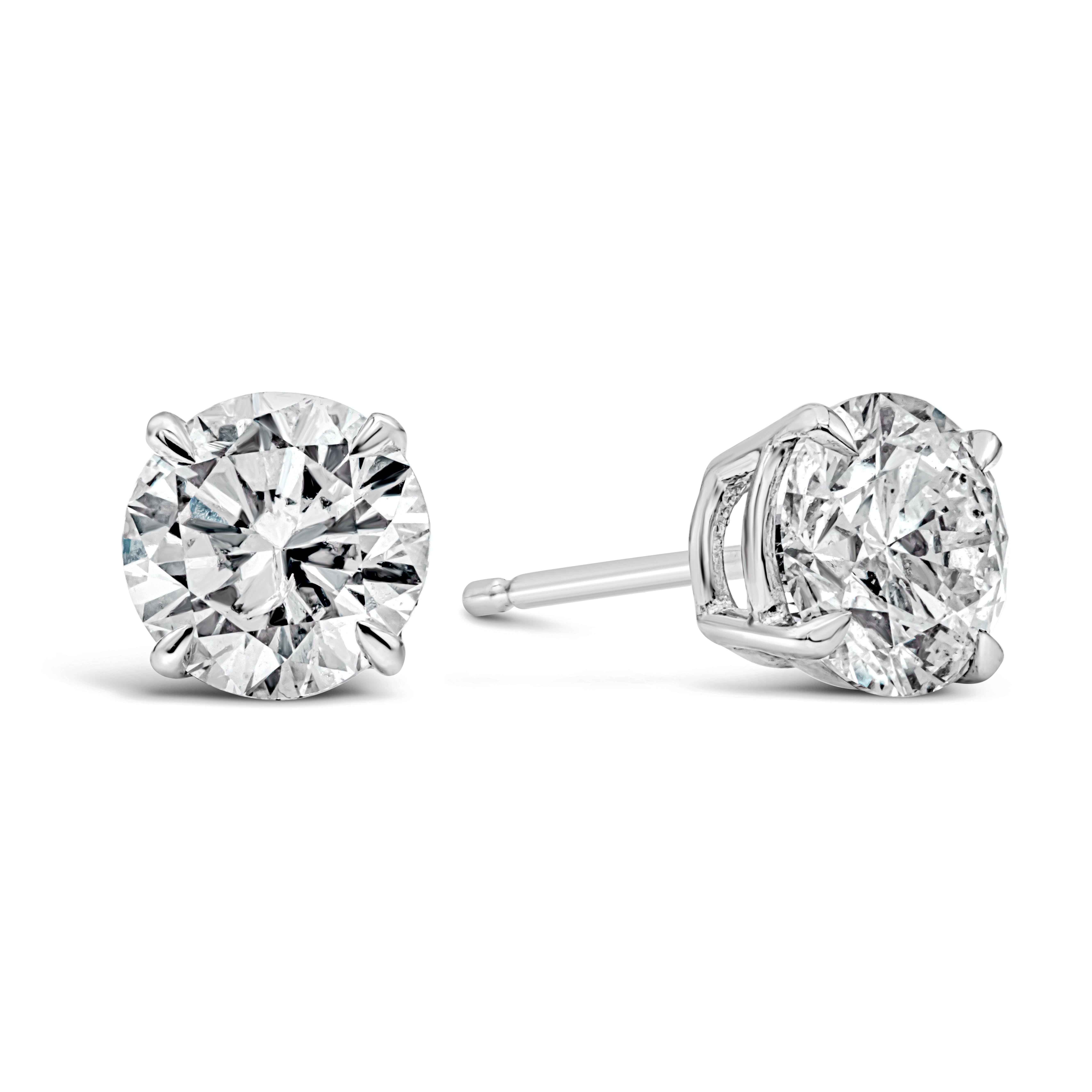 This simple yet classic style of stud earrings showcasing a pair of round brilliant diamonds weighing 2.08 carats total, set in an 14k and 18k white gold mounting. Diamonds are approximately F color, SI3 in clarity.

Style available in different