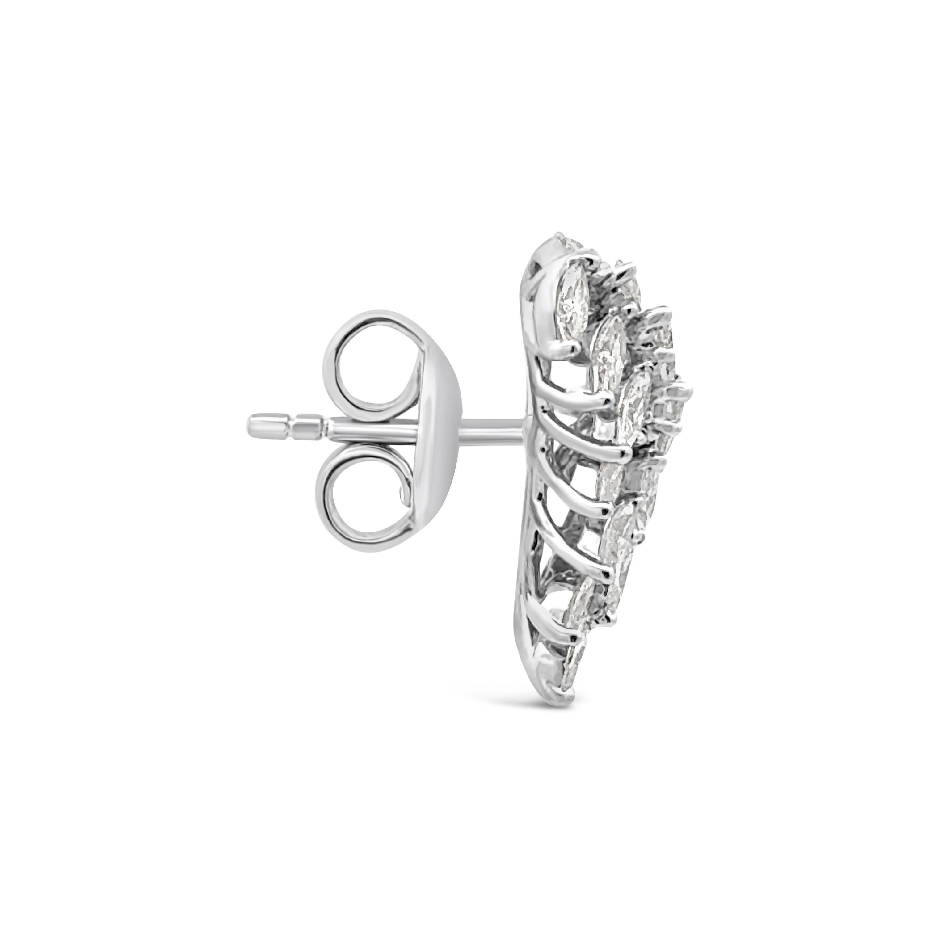 A beautiful pair of stud earrings, featuring marquise cut diamonds weighing 2.08 carats total, set in a crawler design. Finely made with 18K white gold. Comes with a classic push back security. Perfect for casual or formal events. 

Roman Malakov is