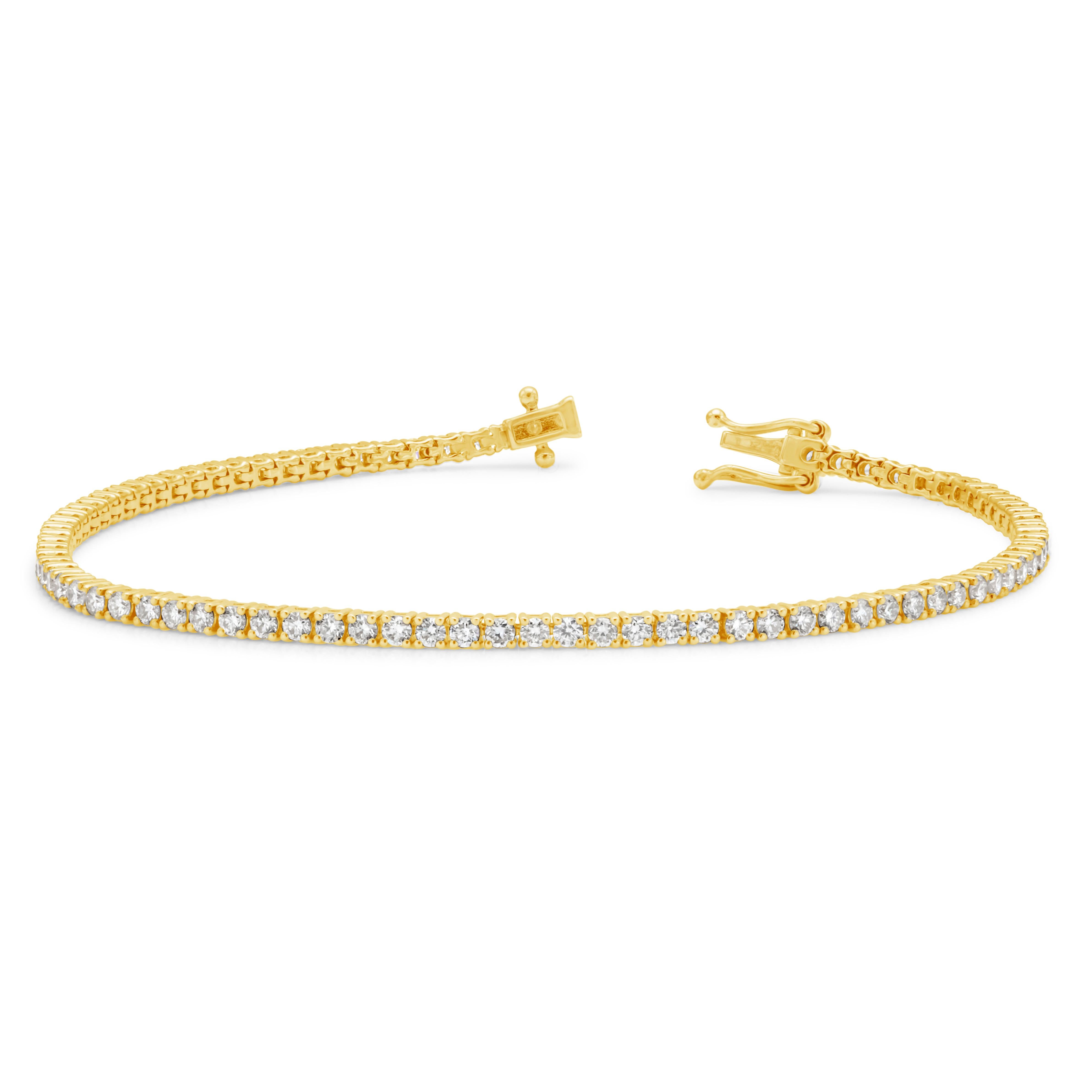 A classic tennis bracelet style showcasing 84 round brilliant diamonds weighing 2.16 carats total, F Color and VS2-SI1 in Clarity. Set in a four prong setting and Made with 18K yellow gold. 17.5cm in length and 1.80mm in width.

Style available in
