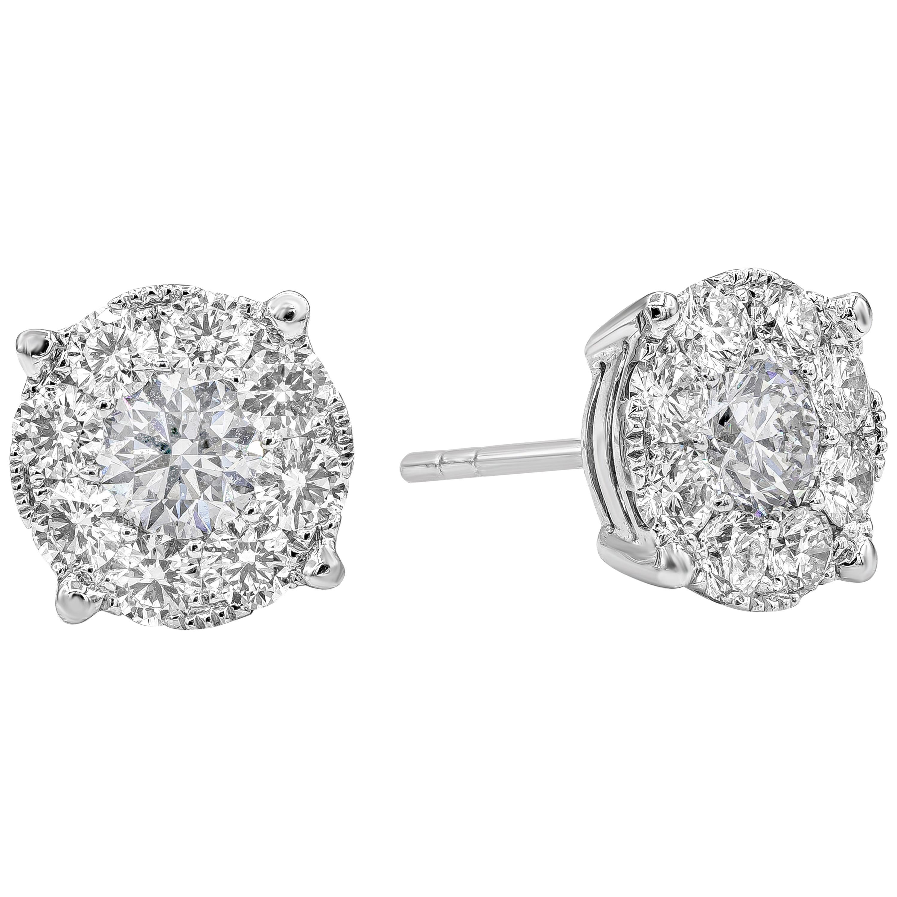 Questi orecchini versatili presentano un gruppo di diamanti tondi brillanti incastonati in un design a illusione. Due diamanti centrali per un peso totale di 0,95 carati circondati da un diamante rotondo in cerchio per un peso totale di 1,29 carati.