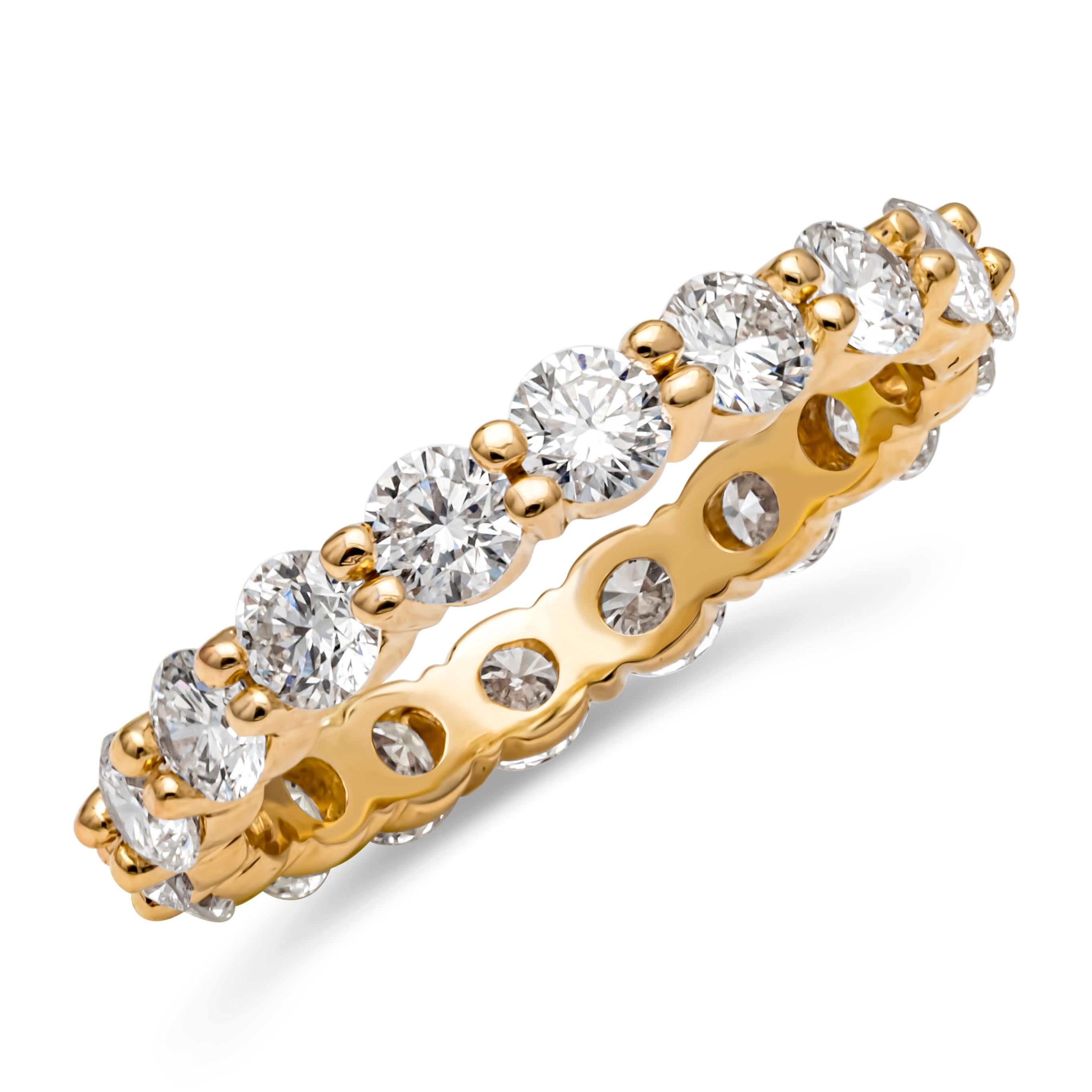 This classic eternity wedding band showcases a line of 18 brilliant round cut diamonds weighing 2.30 carats total, G color and VS+ in clarity, set in a timeless shared prong basket setting and Finely made in 14K Yellow Gold. Size 6.75 US resizable