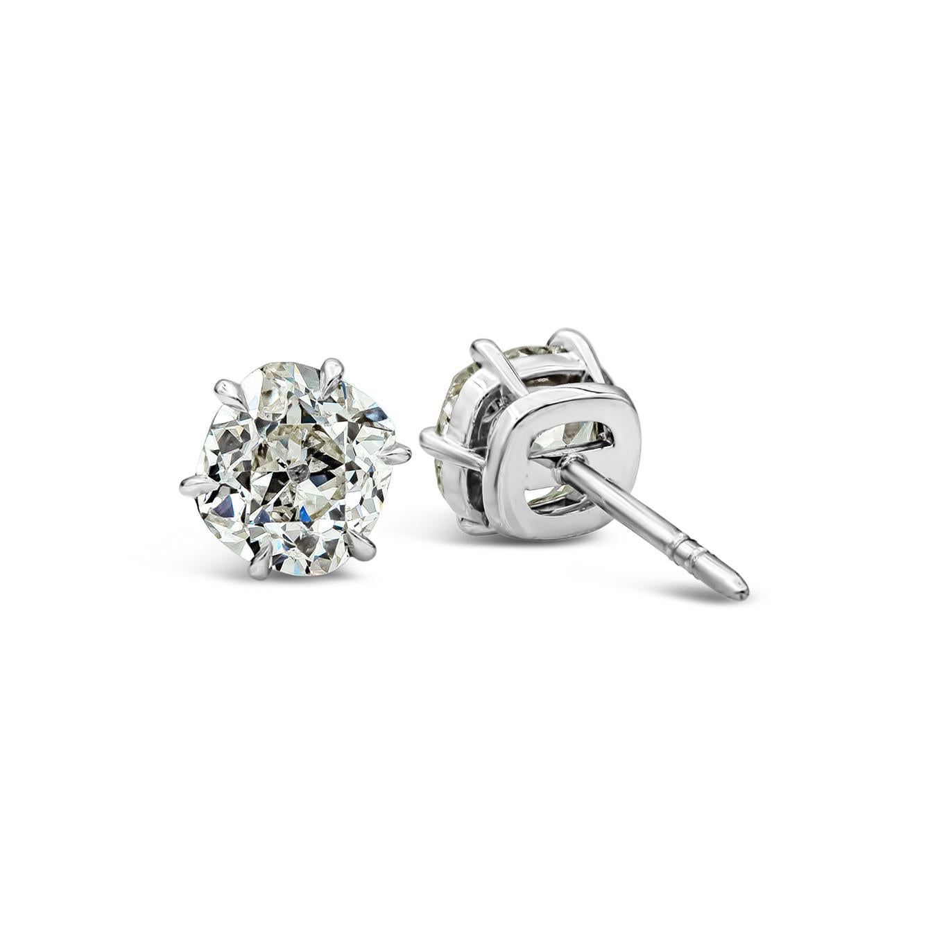 A unique pair of stud earrings showcasing two antique old mine cut diamonds weighing 2.31 carats total, I-J Color and SI2 in Clarity. Set in a six prong setting, Made in Platinum. 

Roman Malakov is a custom house, specializing in creating anything