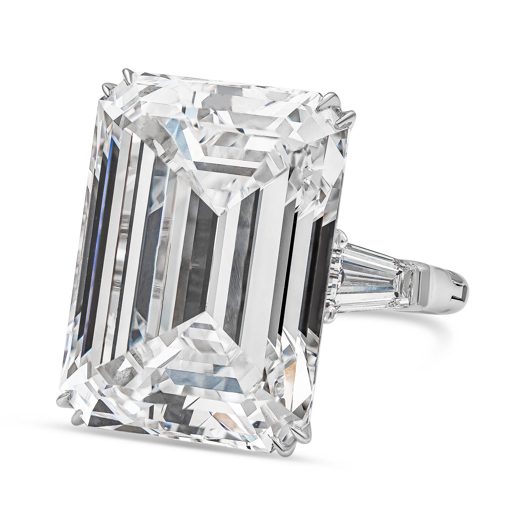 An important and very rare engagement ring showcasing a 25.32 carats emerald cut diamond certified by GIA as D color and IF in clarity, Excellent polish and Excellent Symmetry. Center stone flanked by tapered baguette diamonds weighing 1.01 carats