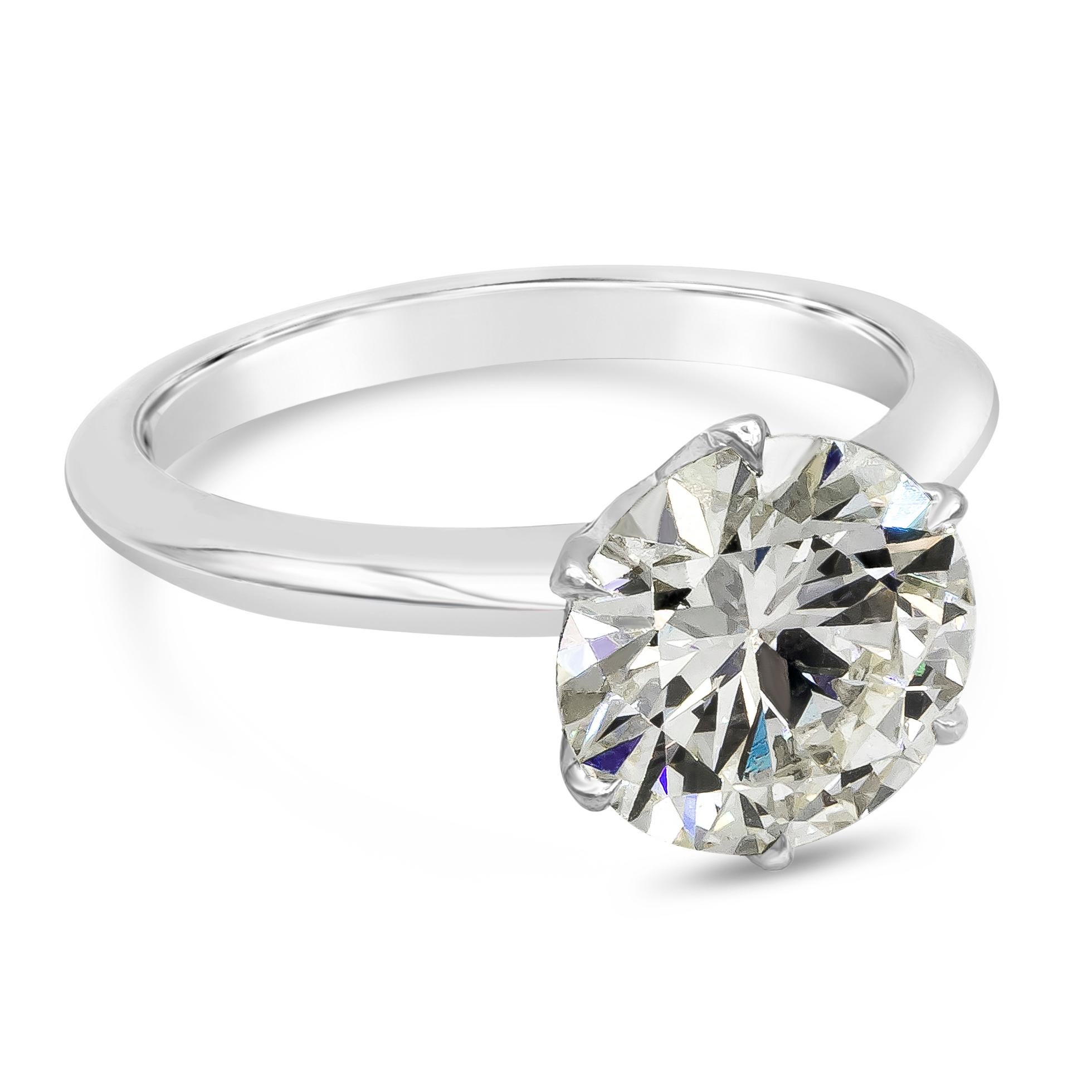 A classic solitaire engagement ring, featuring 2.51 carats round brilliant cut diamond certified by GIA as L color and SI1 clarity. Set on a six claw prong basket with knife-edge setting made of platinum. Size 6 US, resizable upon request.

Roman