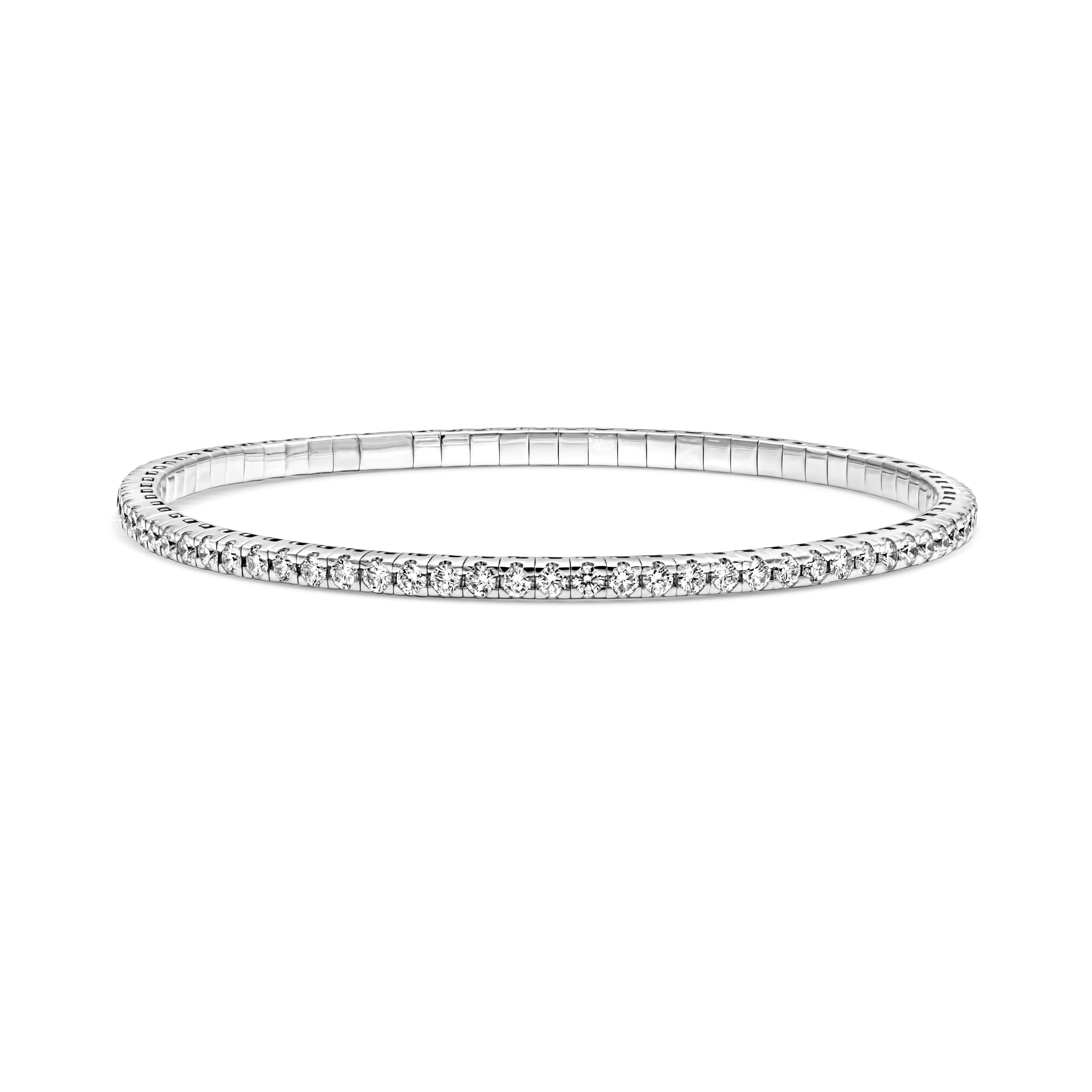 A classic tennis bracelet style showcasing a row of 78 brilliant round diamonds weighing 2.54 carats total, F color and VS2-SI1 n clarity, set in a stretchable 18k white gold mounting. 7inches in length.

Roman Malakov is a custom house,