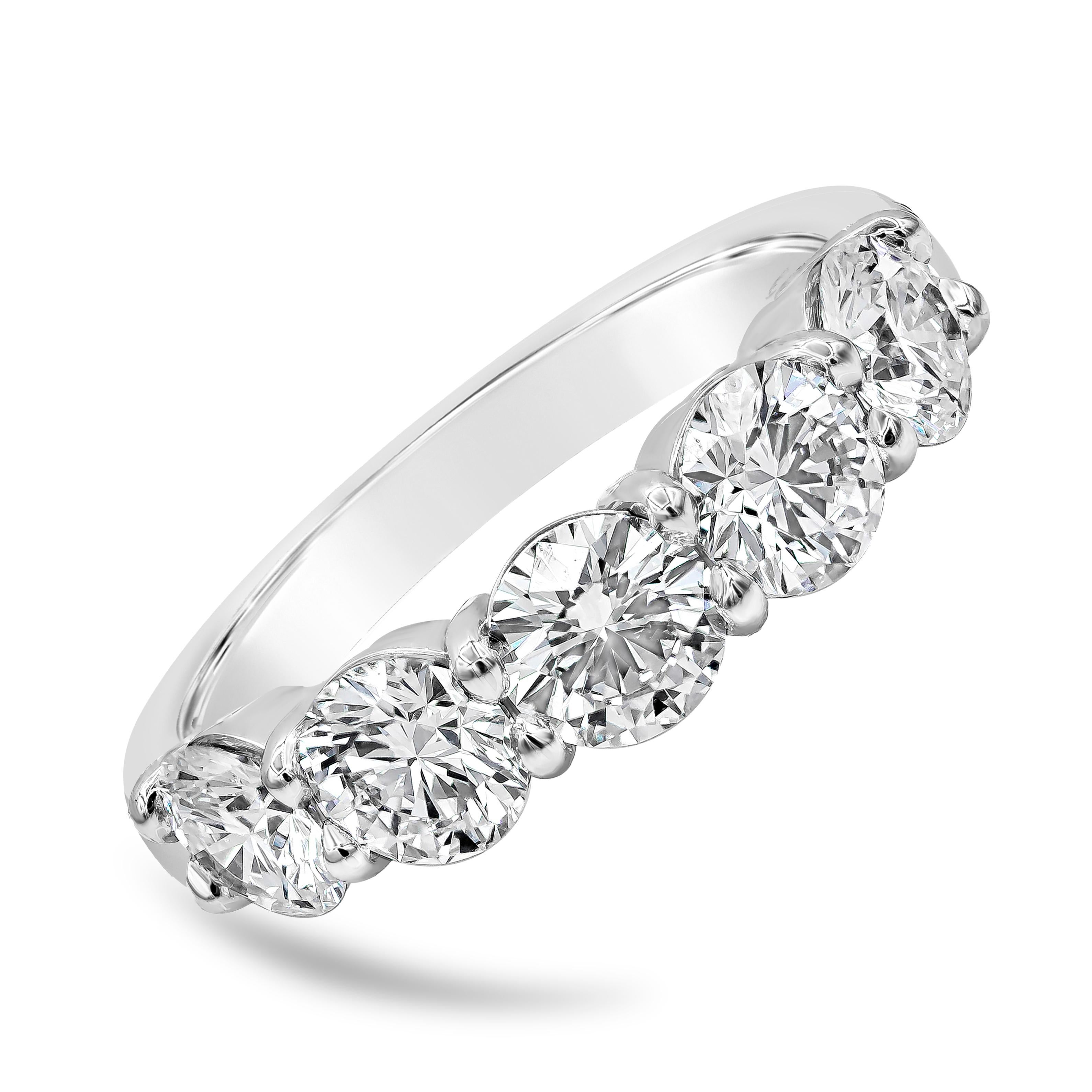 A classic wedding band style showcasing five stones of round brilliant diamonds weighing 2.58 carats total, F Color and VS in Clarity. Set in a timeless shared-prong setting, Finely made in platinum. Size 7 US resizable upon request.

Style