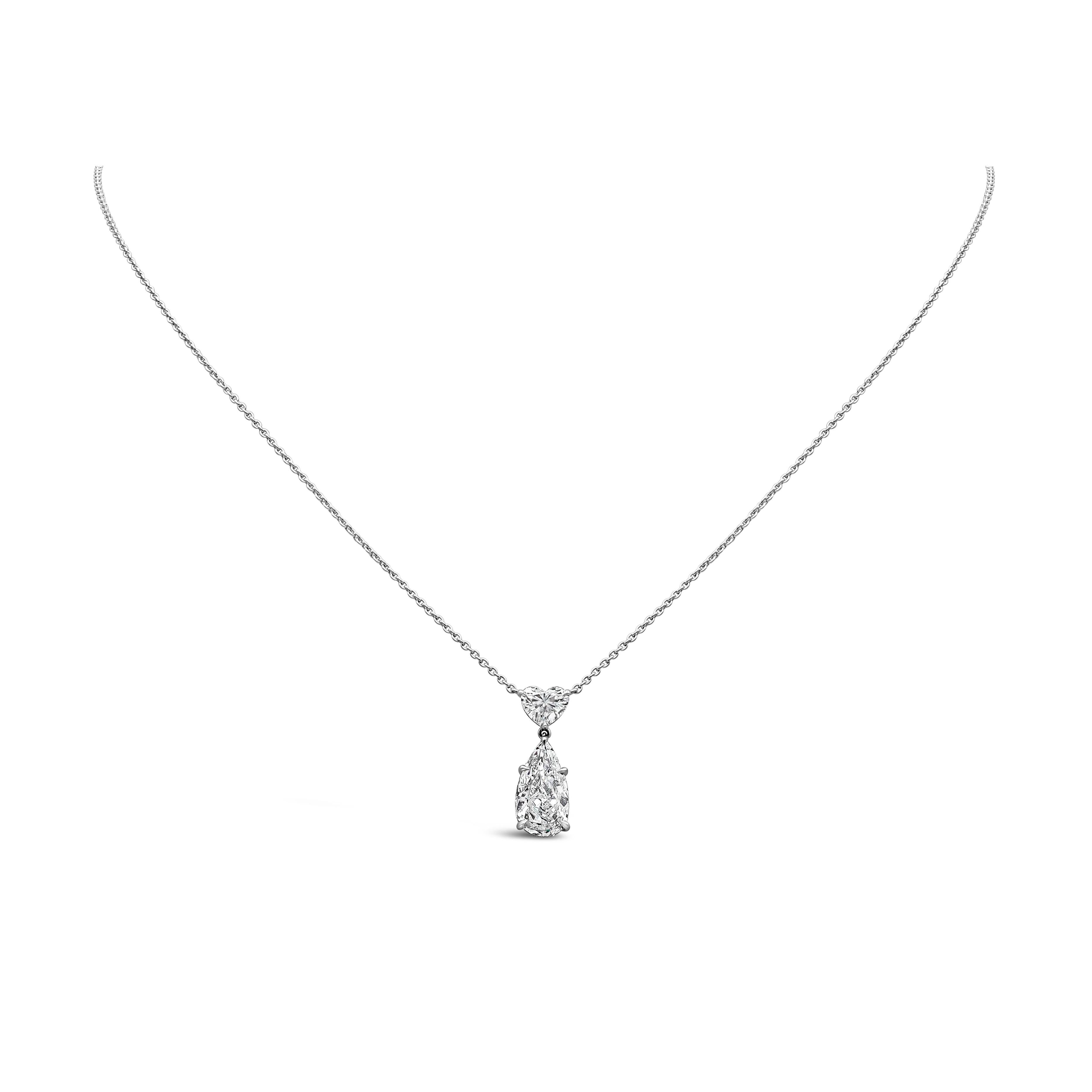 This simple and beautiful drop pendant necklace showcases a 2.00 carat Pear shape, H color SI1 clarity, hanging from a 0.60 carat Heart shape diamond. Connected to a platinum chain. 16 inches in Length, adjustable upon request.

Roman Malakov is a