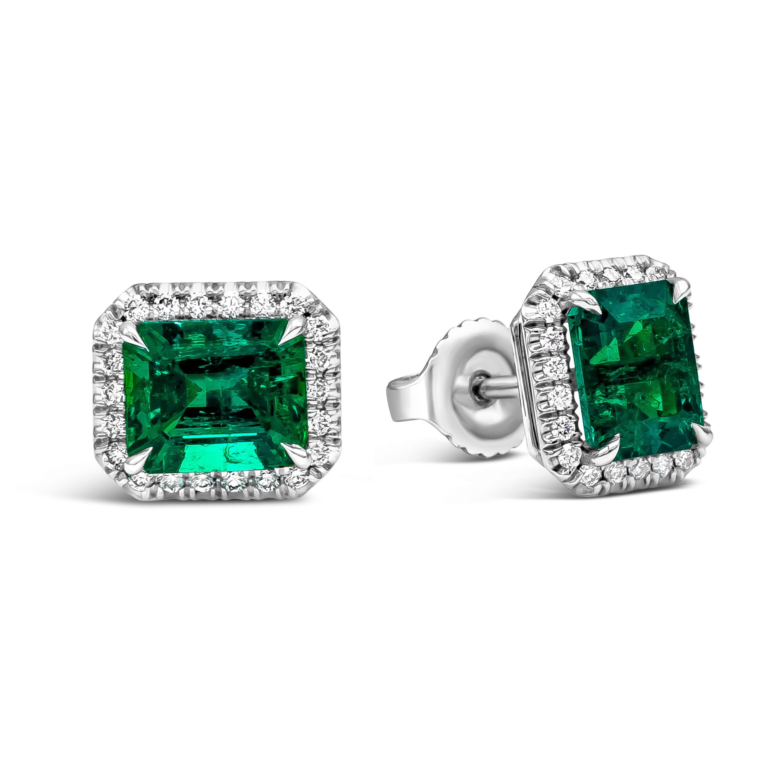 Contemporary 2.41 Carats Emerald Cut Colombian Muzo Emerald with Diamond Halo Stud Earrings For Sale