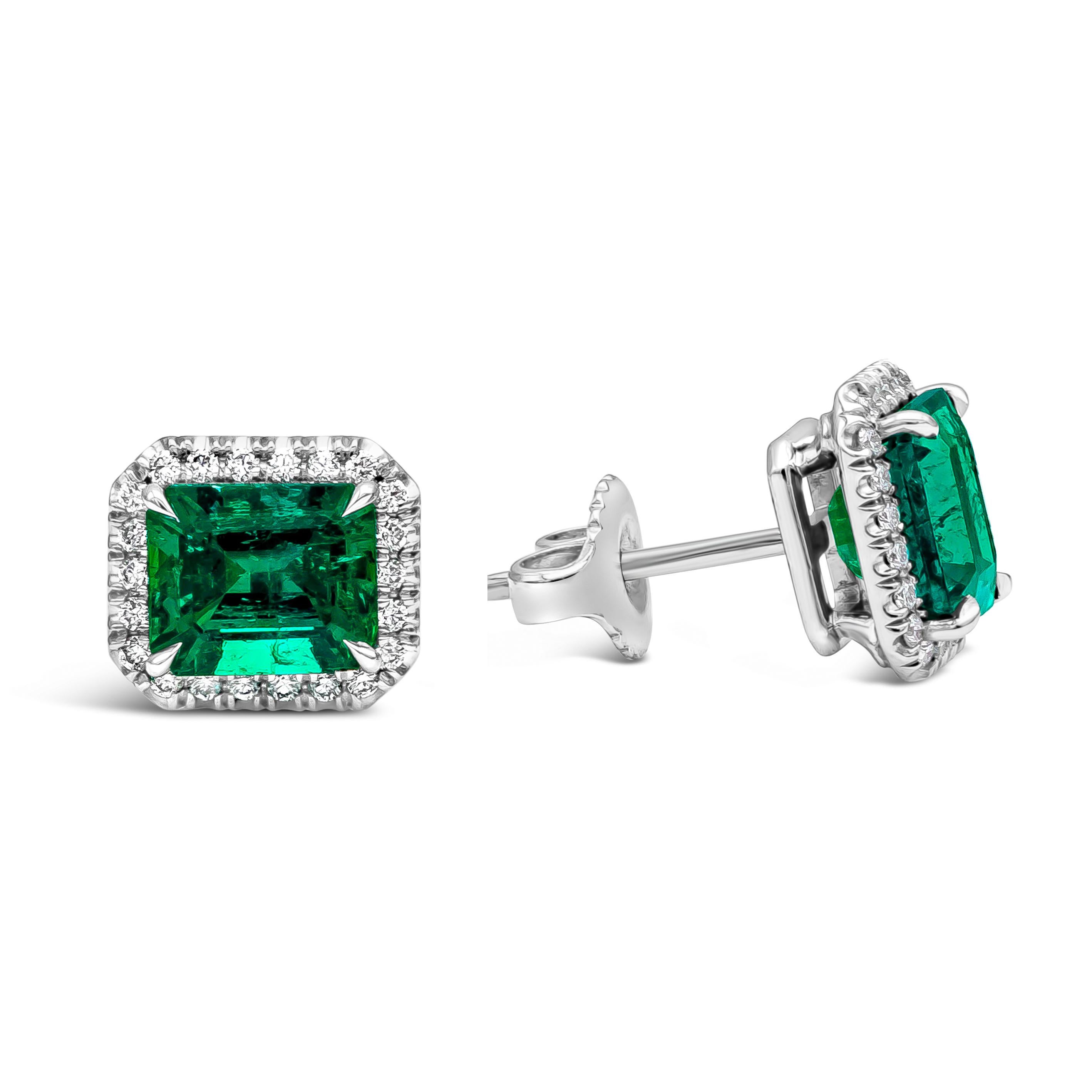 2.41 Carats Emerald Cut Colombian Muzo Emerald with Diamond Halo Stud Earrings In New Condition For Sale In New York, NY