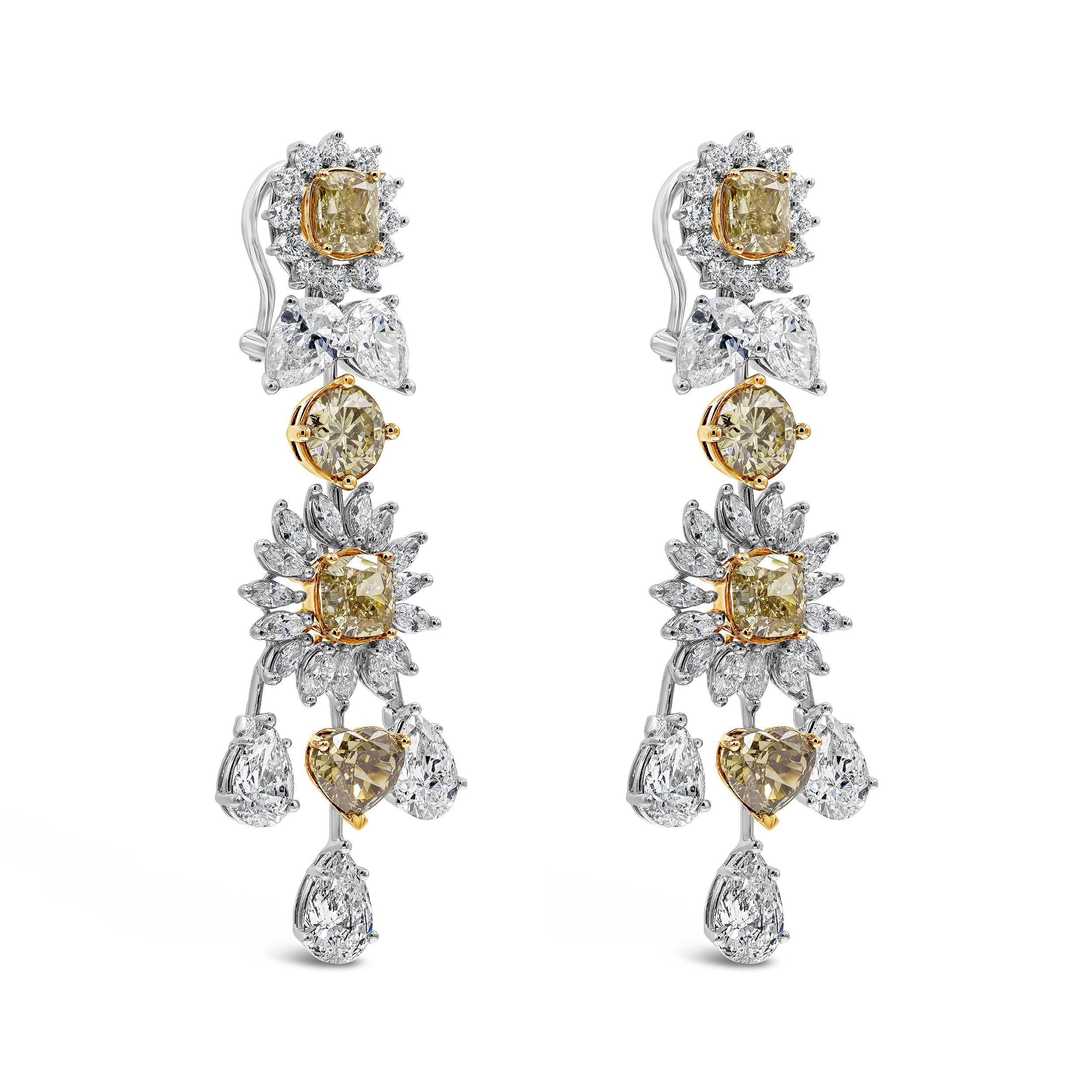 A brilliant piece of chandelier style earrings showcasing a brownish cognac diamond in mixed fancy shapes weighing 11.99 carats total. Accented by a variety of fancy shape diamonds weighing 14.35 carats total. An outstanding piece of jewelry. Made