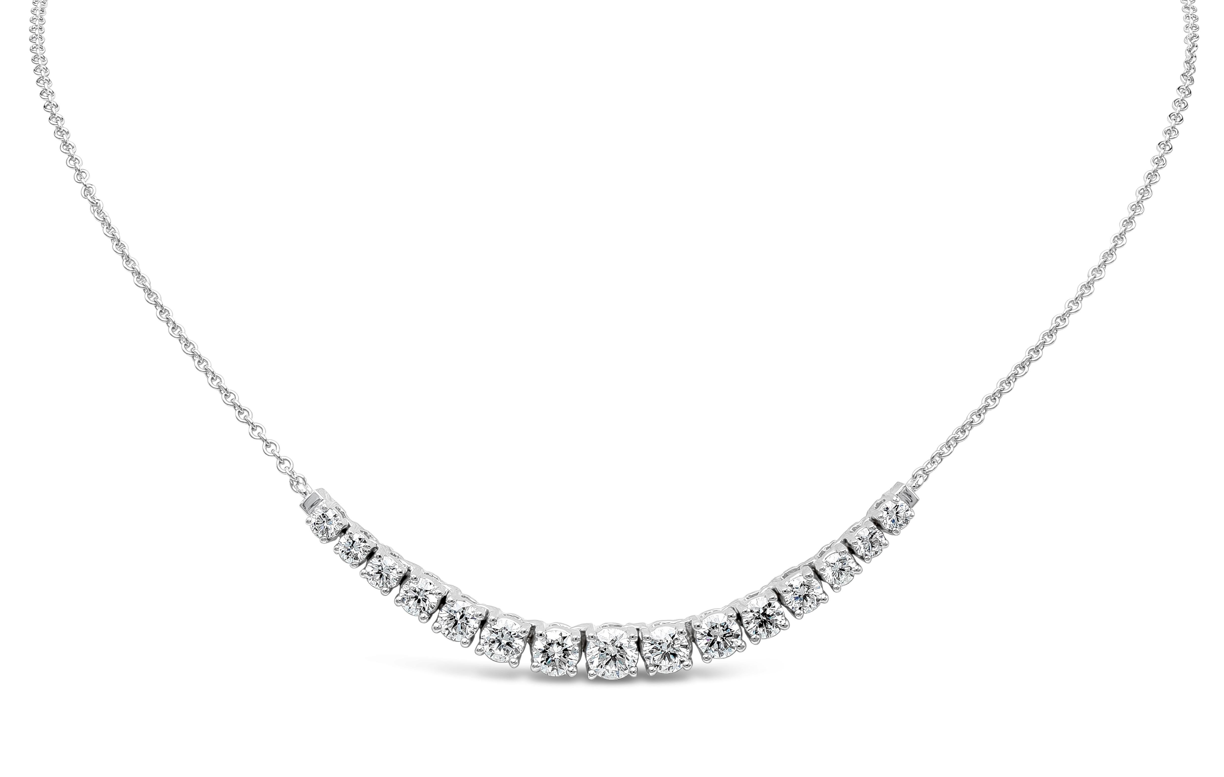 A fashionable mini riviere style necklace showcasing graduating round brilliant cut diamonds ,suspended on an 18 inch White Gold chain and set in a three prong basket setting. Diamonds weigh 2.70 carats total and are approximately F-G color, SI-I1