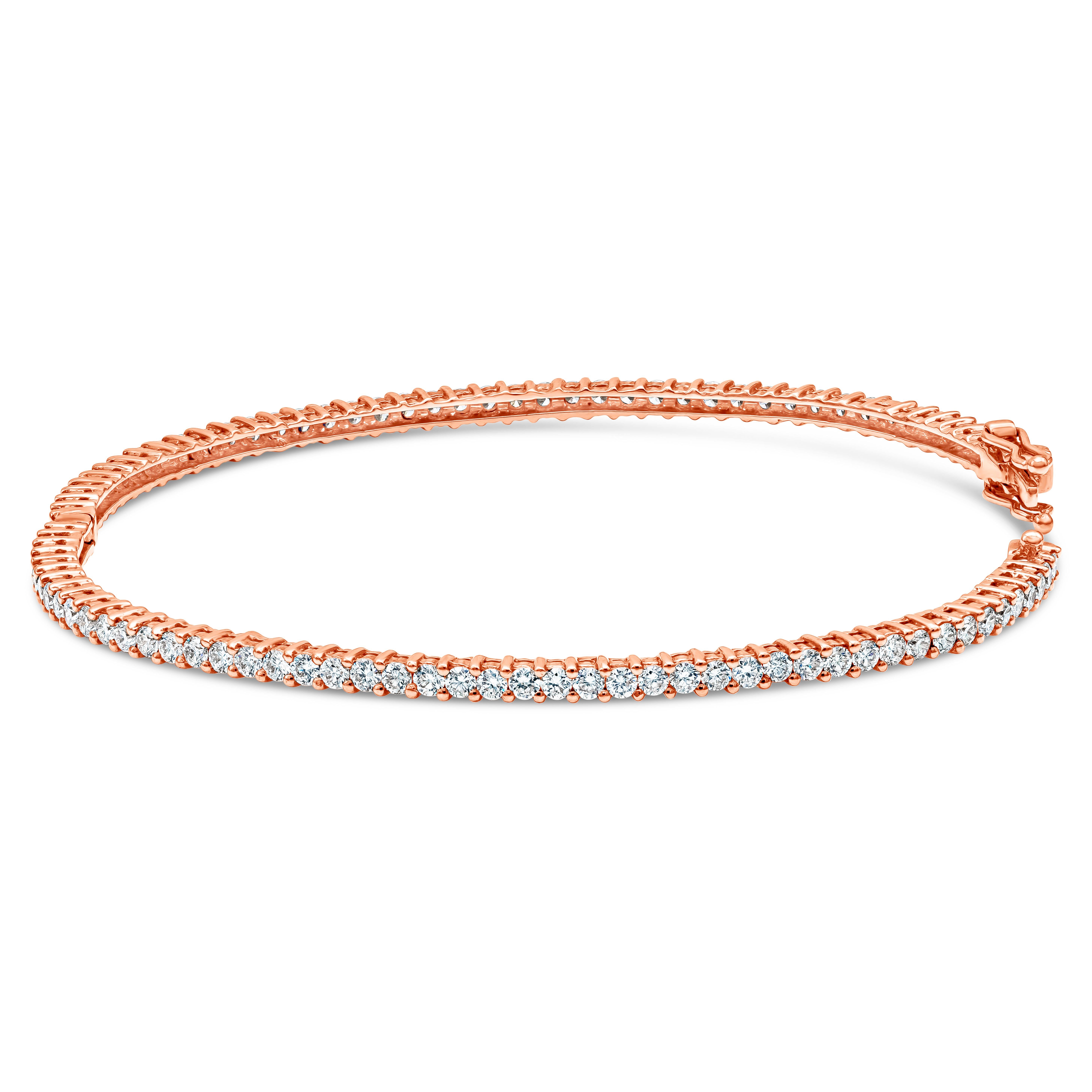 A classic bangle bracelet eternity encrusted with round brilliant diamonds weighing 2.79 carats total. Made with 18K Rose Gold.

Roman Malakov is a custom house, specializing in creating anything you can imagine. If you would like to receive a