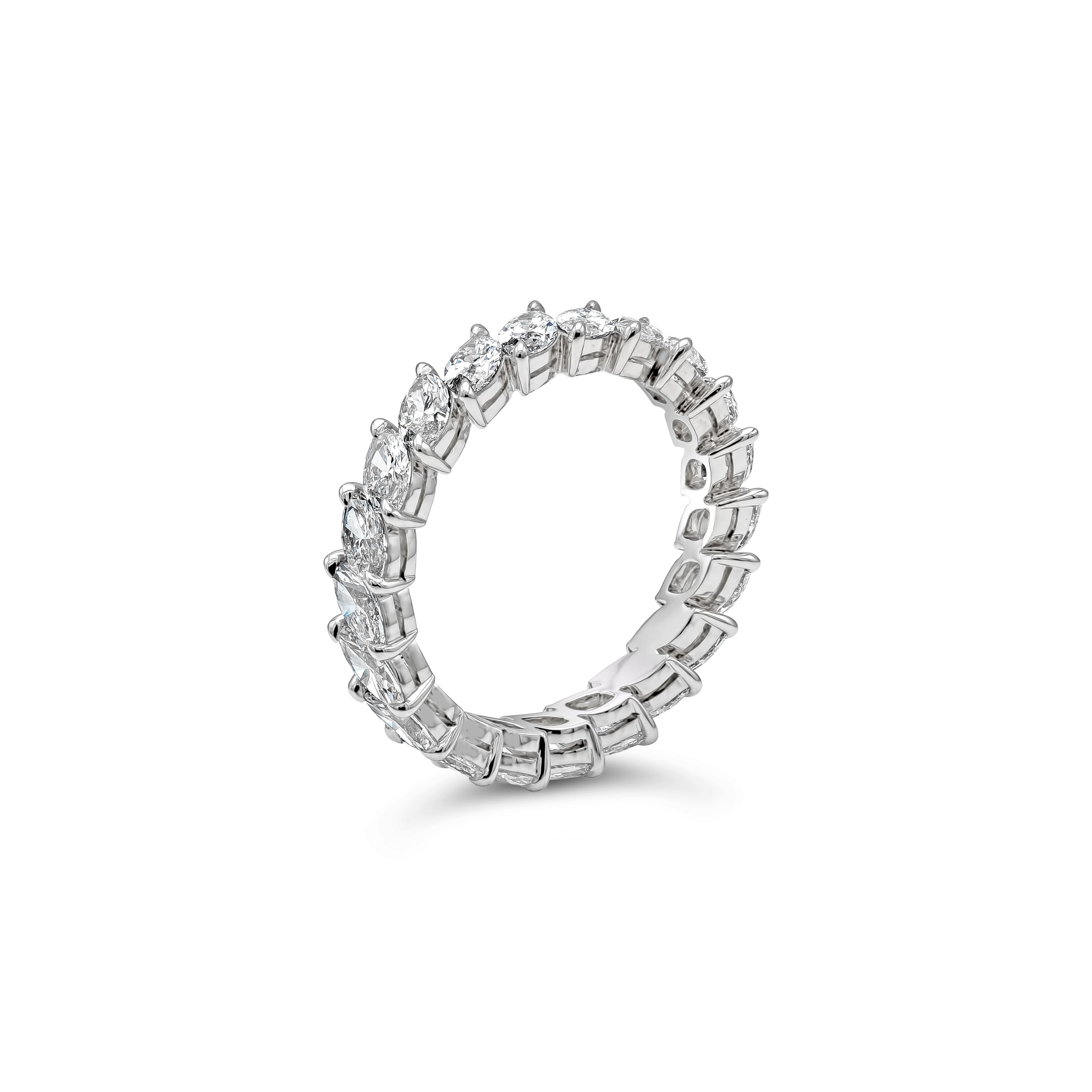 A brilliant and unique eternity band style featuring 21 brilliant marquise cut diamonds set diagonally that weighs about 2.80 carats total G-H Color and VS+ Clarity. Made with  Platinum. Size 6.75 US.

Roman Malakov is a custom house, specializing