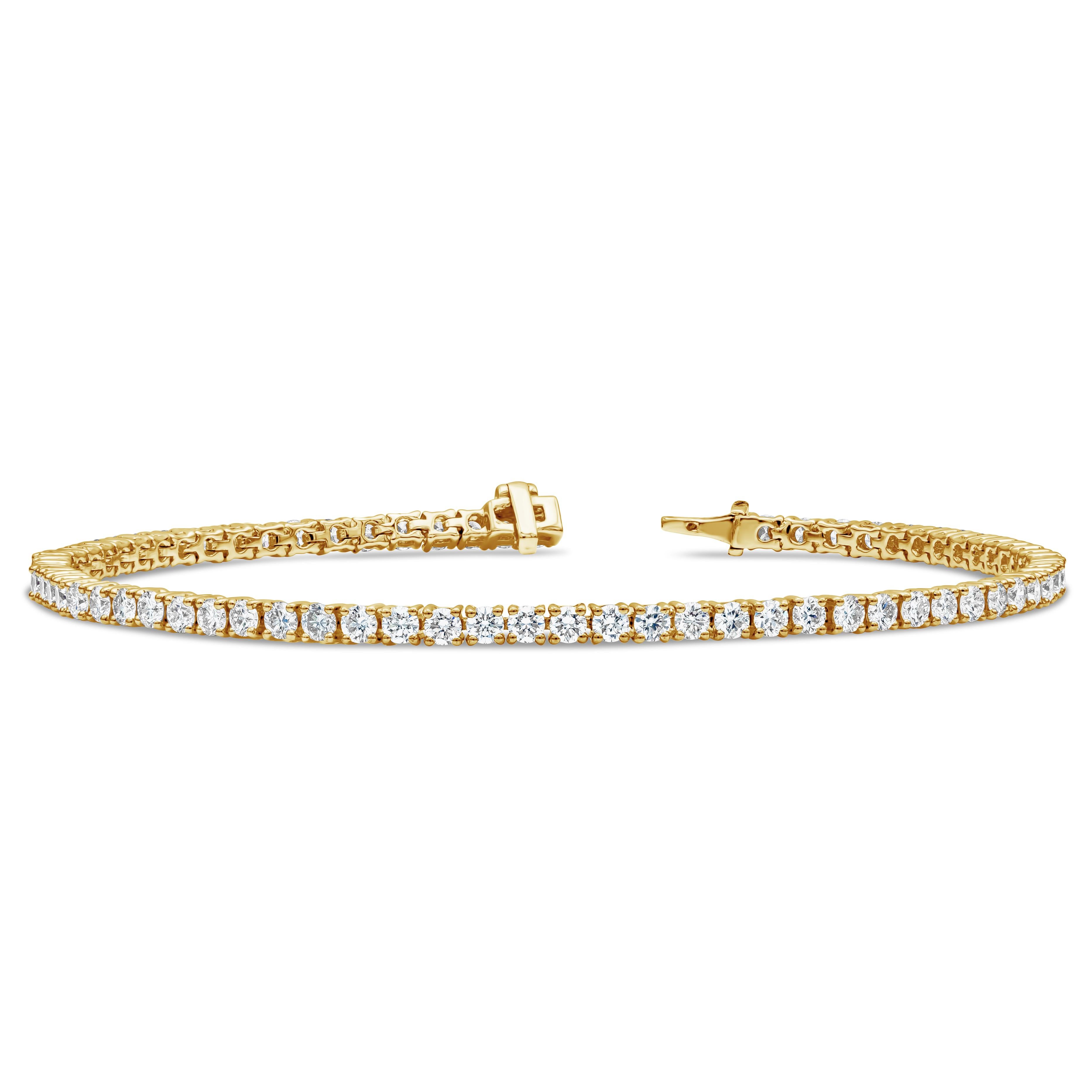 ﻿A classic tennis bracelet style showcasing 76 round brilliant diamonds, Diamonds weigh 3.07 carats total and are approximately F color and VS clarity. 7 inches in Length. 2.15mm in Width. Made with 18K Yellow Gold

Roman Malakov is a custom house,
