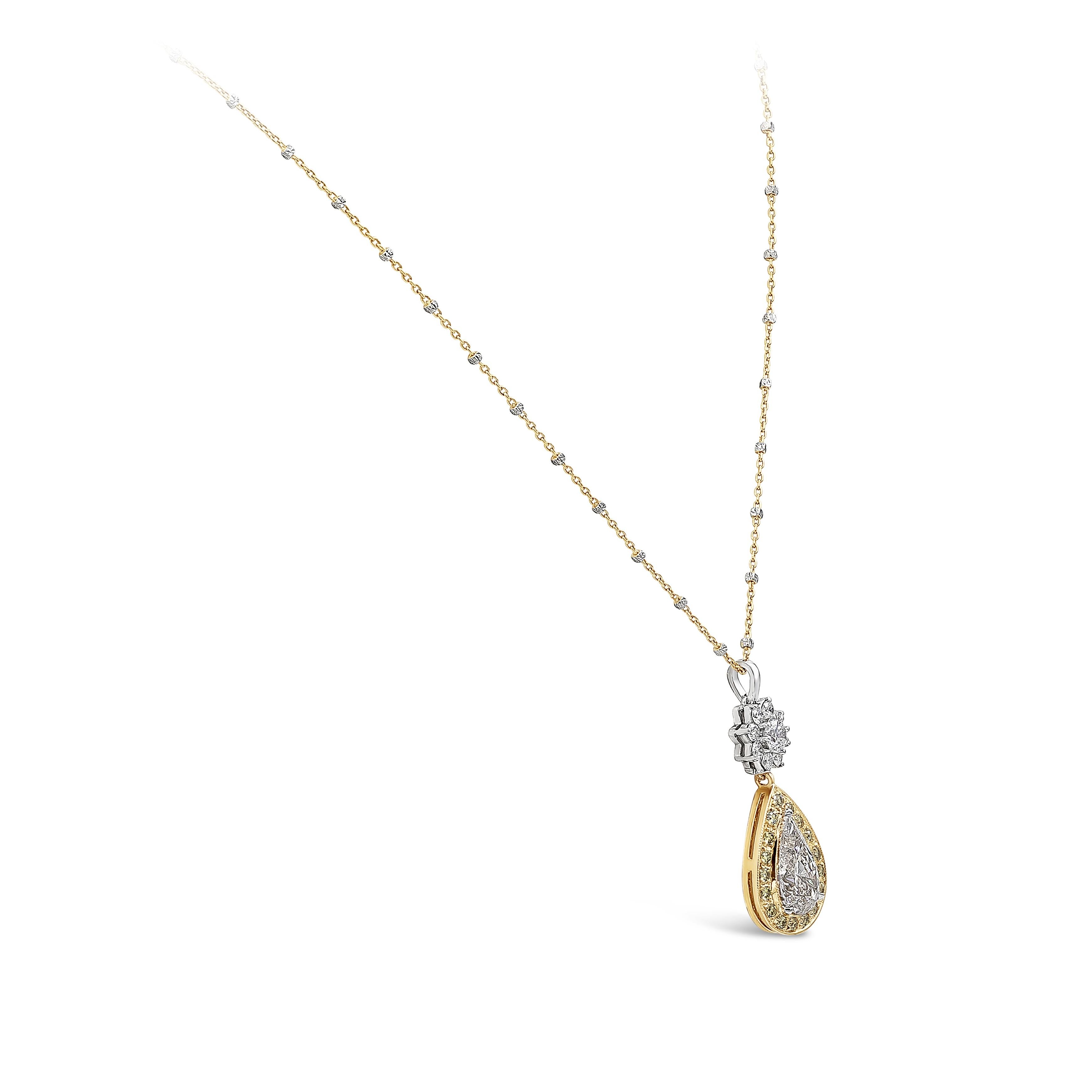 A unique and brilliant pendant necklace showcasing a 3.12 carats pear shape diamond certified by GIA as N (light brown) color, SI2 in clarity. Surrounded by a row of brilliant round yellow diamonds and suspended on a cluster of white brilliant