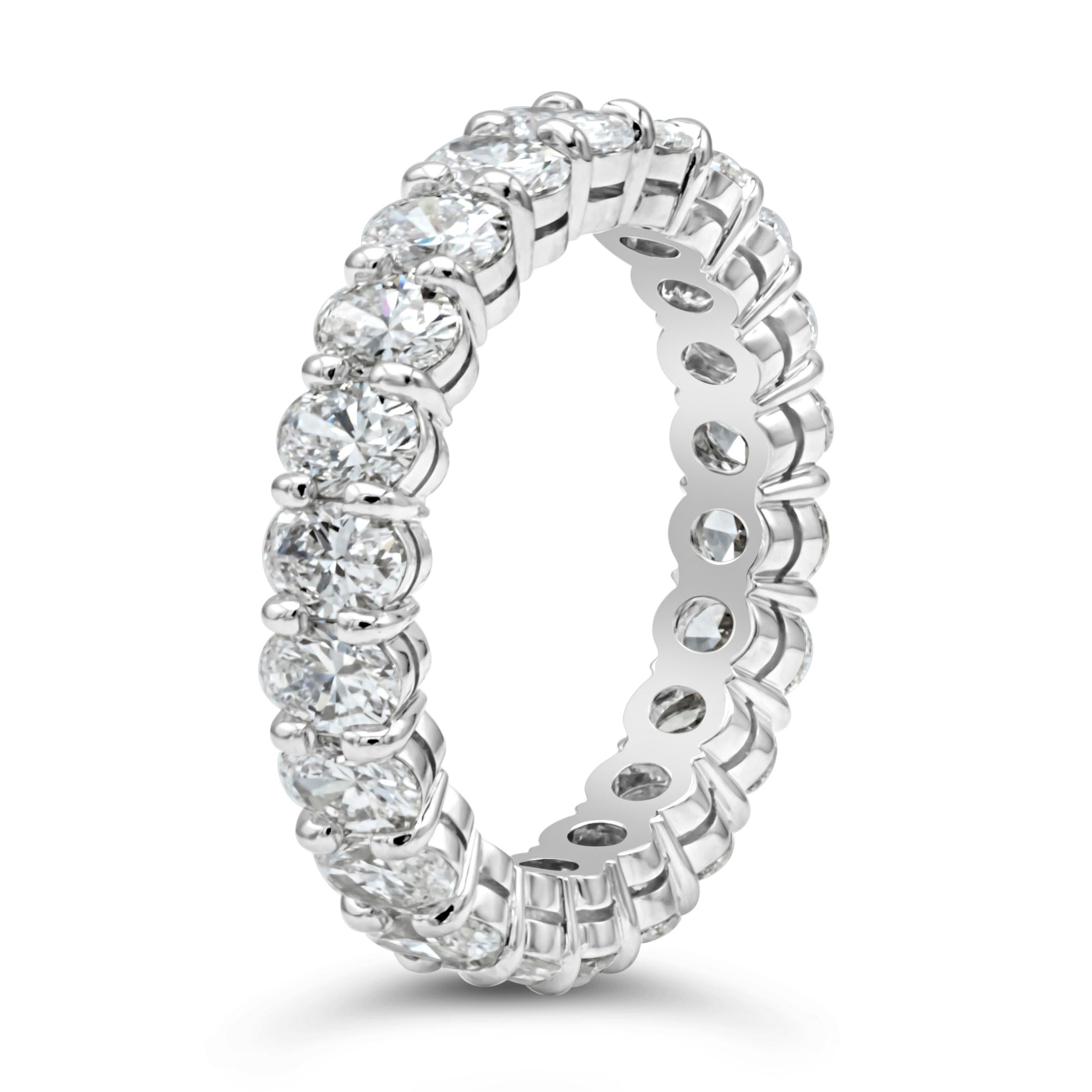 A timeless and classic eternity wedding band showcasing 22 pieces of sparkling oval cut diamonds weighing 3.18 carats total, E-F color and VS-SI in clarity. Beautifully set in a shared two prong setting, Made in Platinum.

Roman Malakov is a custom