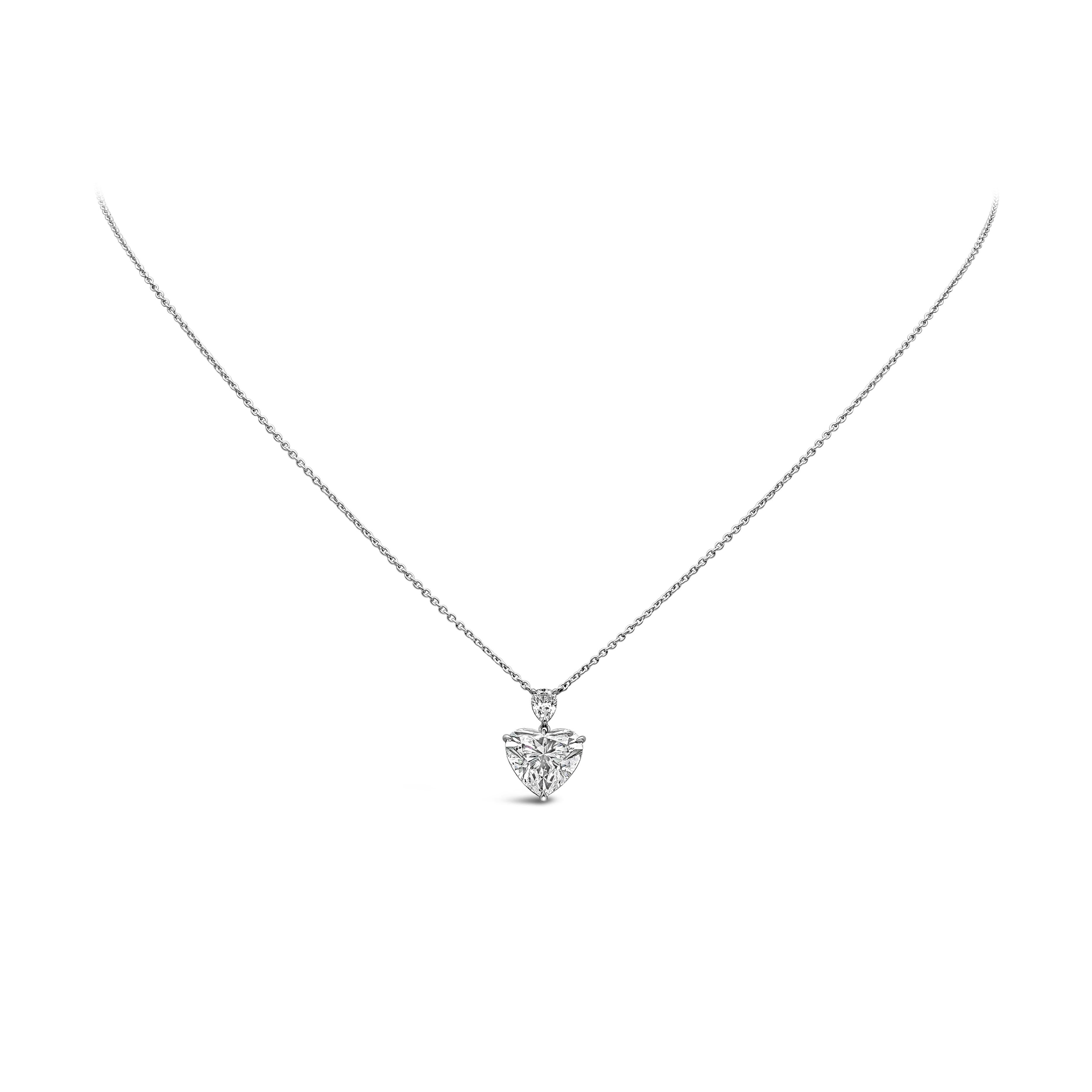 This beautiful pendant necklace showcases a 3.21 carat heart shape diamond GIA certified as H color and SI2 in clarity. Set in a three prong setting hanging from a 0.23 carat pear shape diamond.  Connected to a 16 inch platinum chain.

Roman Malakov