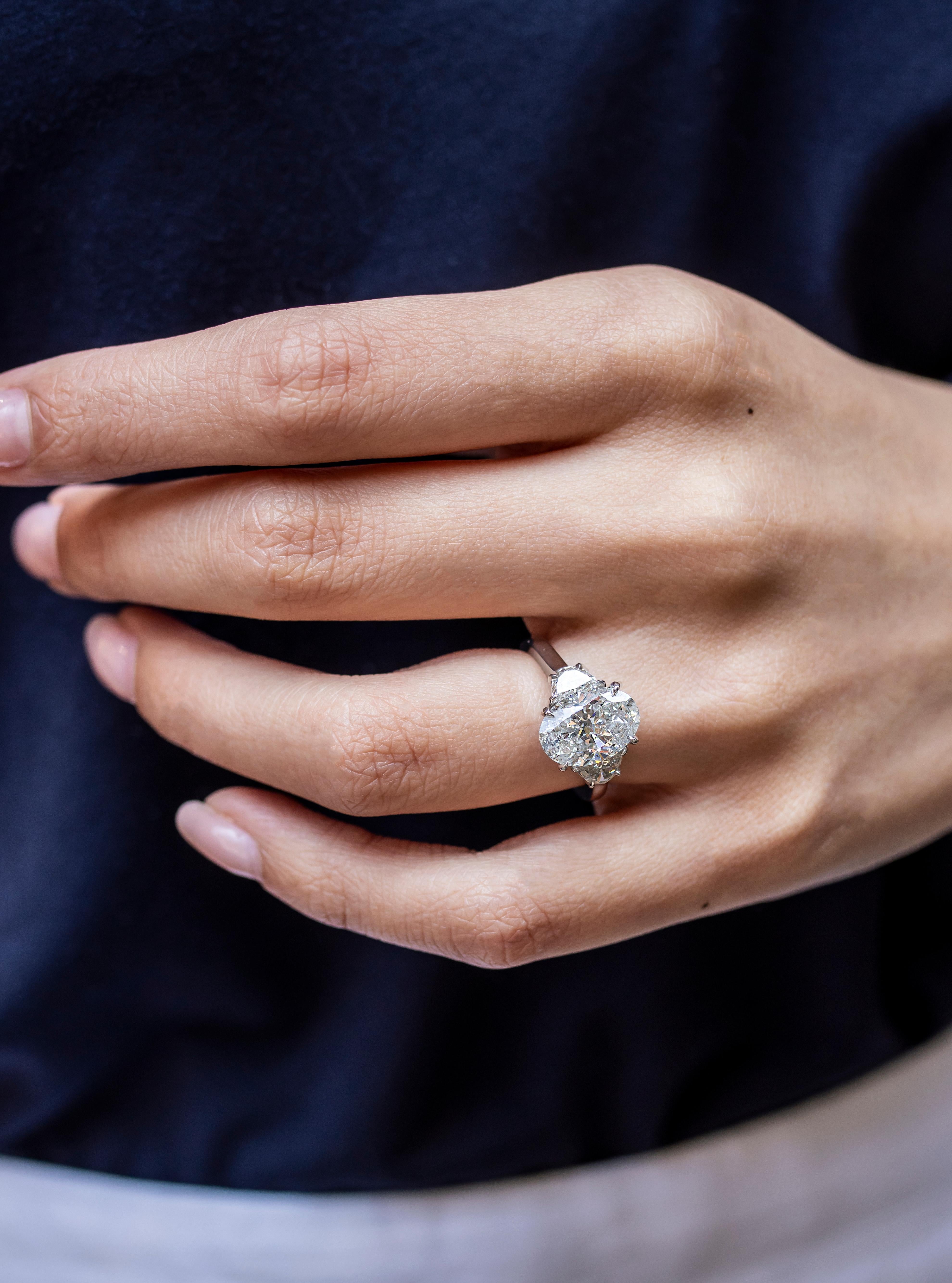 Contemporary Roman Malakov 3.23 Carats Oval Cut Diamond Three-Stone Engagement Ring For Sale