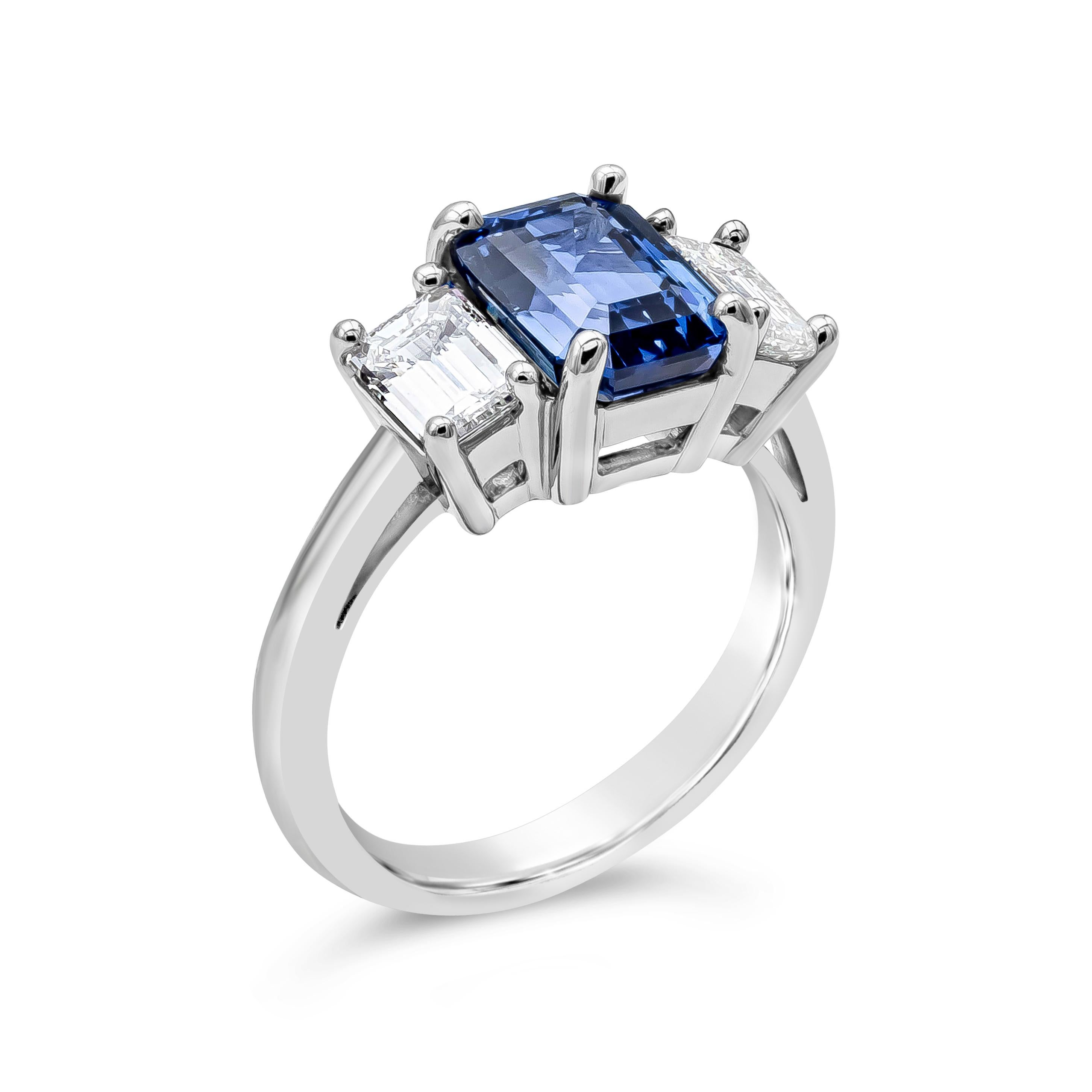 Contemporary GIA Certified 3.25 Carat Emerald Cut Blue Sapphire Three Stone Engagement Ring For Sale