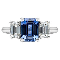 GIA Certified 3.25 Carat Emerald Cut Blue Sapphire Three Stone Engagement Ring