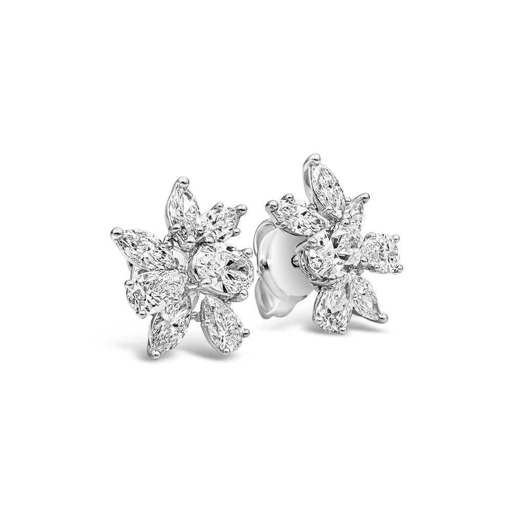 A simple and fashionable pair of stud earrings showcasing a cluster of pear shape and oval diamonds weighing 3.80 carats total. Set in a beautiful floral-motif design, Made with 18K White Gold.

Style available in different price ranges. Prices are