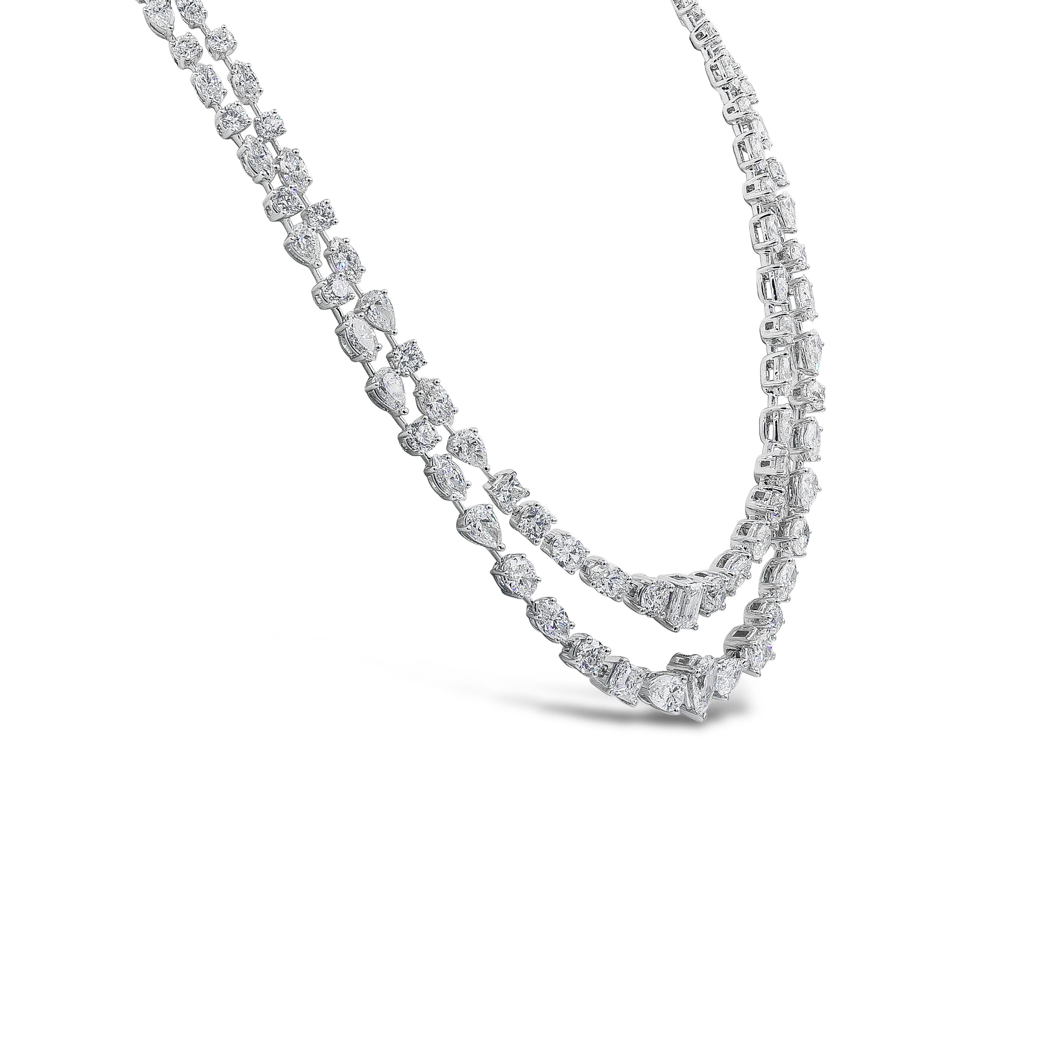 Well crafted high end necklace showcasing 131 pieces of gleaming mixed cut diamonds weighing 36.92 carats total, beautifully set in a magnificent floating design. Set to perfection in 18K white gold. Five diamonds in the necklace are accompanied