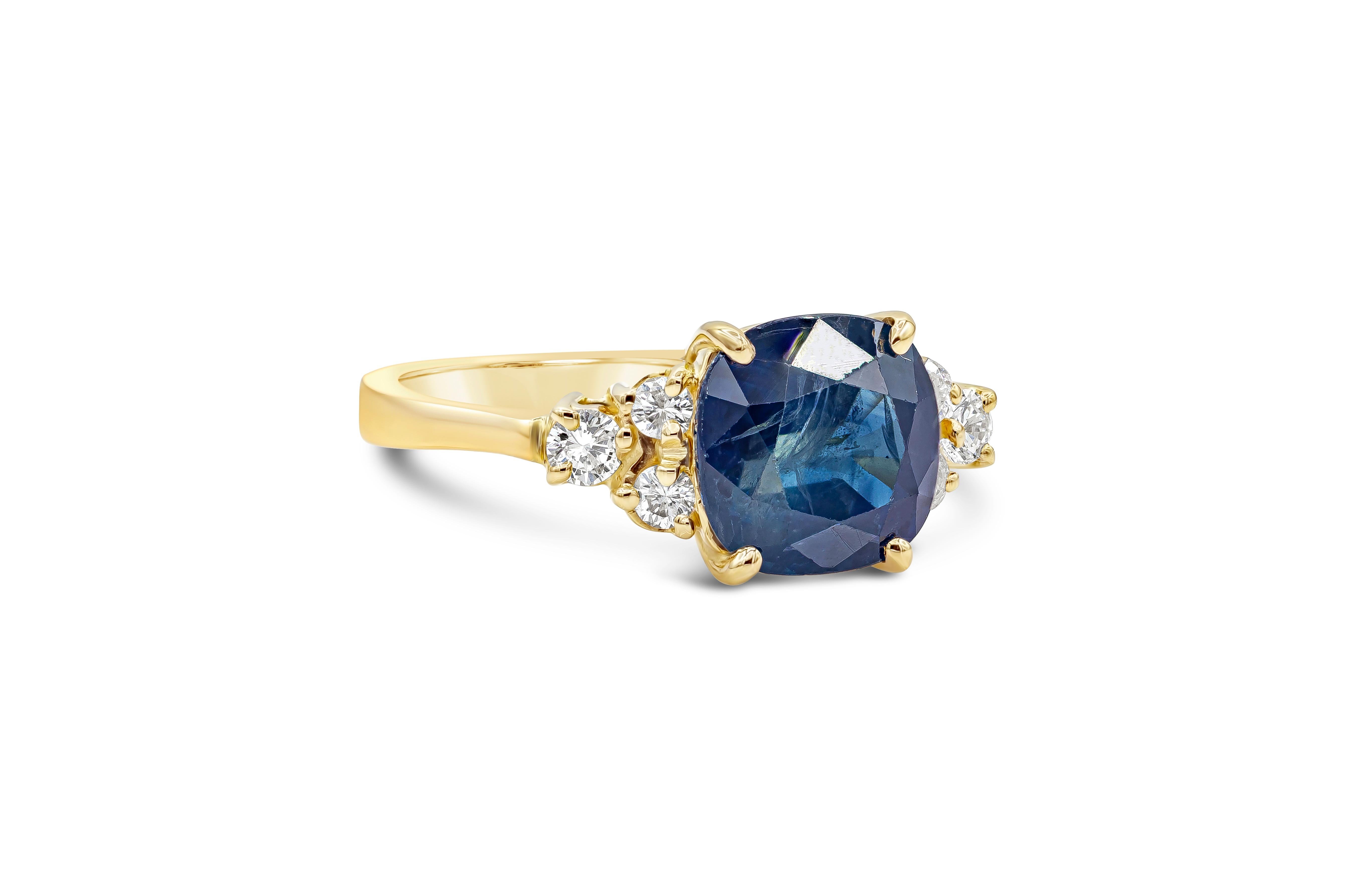 Features a color-rich cushion cut blue sapphire weighing 3.75 carats total. Flanked by round brilliant diamonds set in a triangular style. Diamonds weigh 0.37 carats total. Made with 14K Yellow Gold, Size 7.25 US resizable upon request.

Style