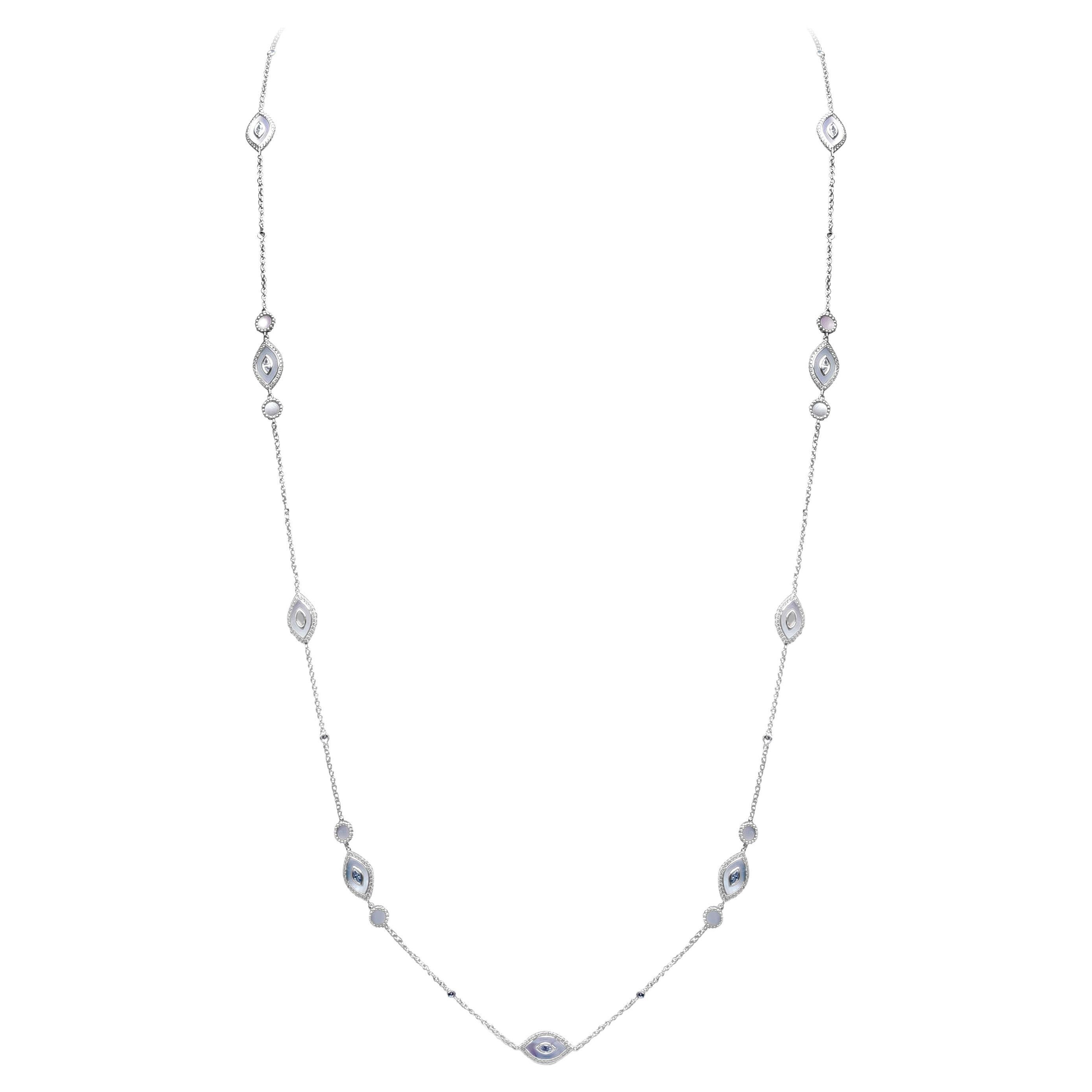 A fashionable long necklace showcasing diamond encrusted and mother of pearl in an evil eye design. Diamonds weigh 3.77 carats total. Made with 18K White Gold. 

Style available in different price ranges. Prices are based on your selection. Please