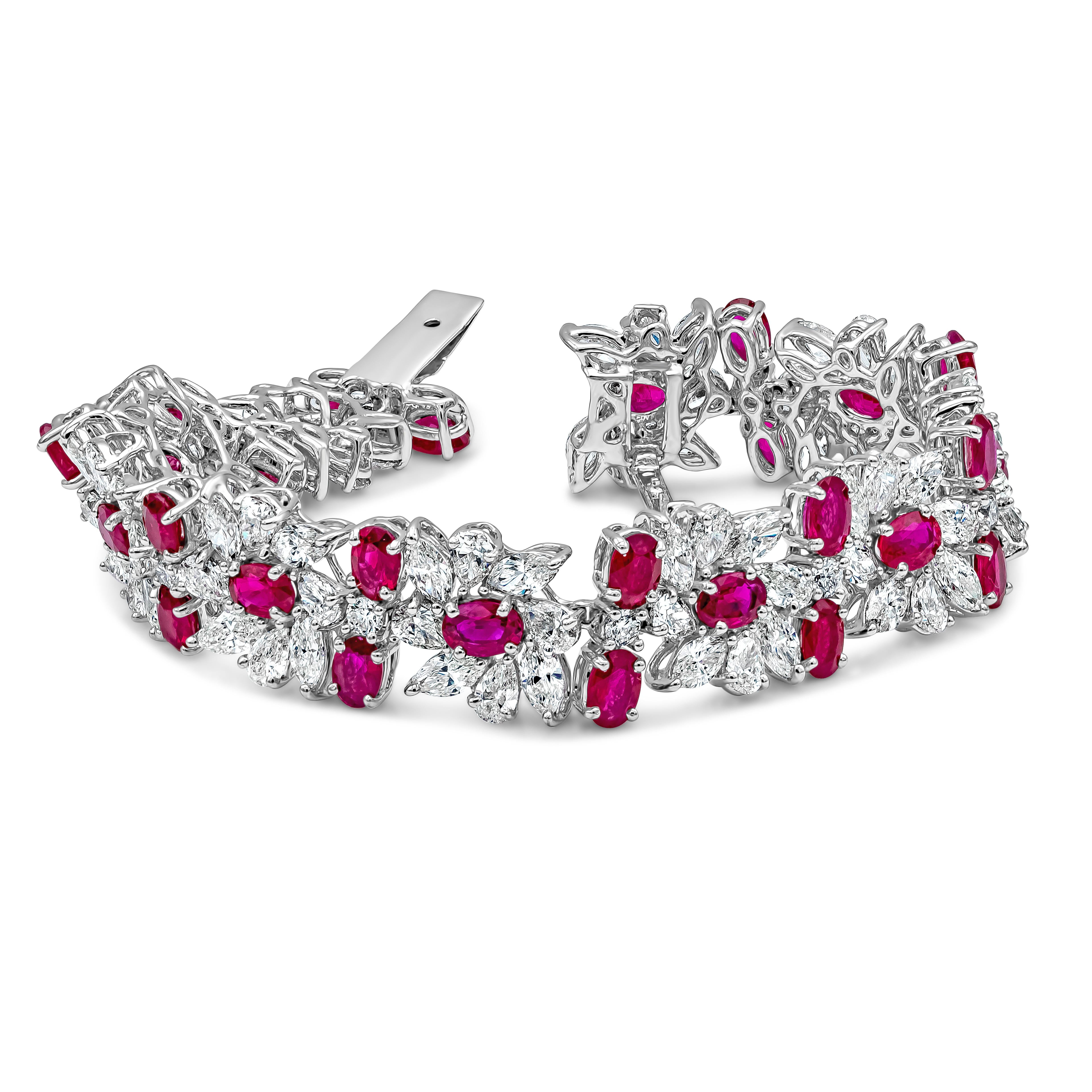 A beautiful delicate, labor intensive cluster bracelet showcasing 38.21 carats total of mix-cut diamonds and rubies. 30 oval cut rubies weighing 17.80 carats, surrounded by marquis cut diamonds weighing 19.27 carats set in a flower-motif design.