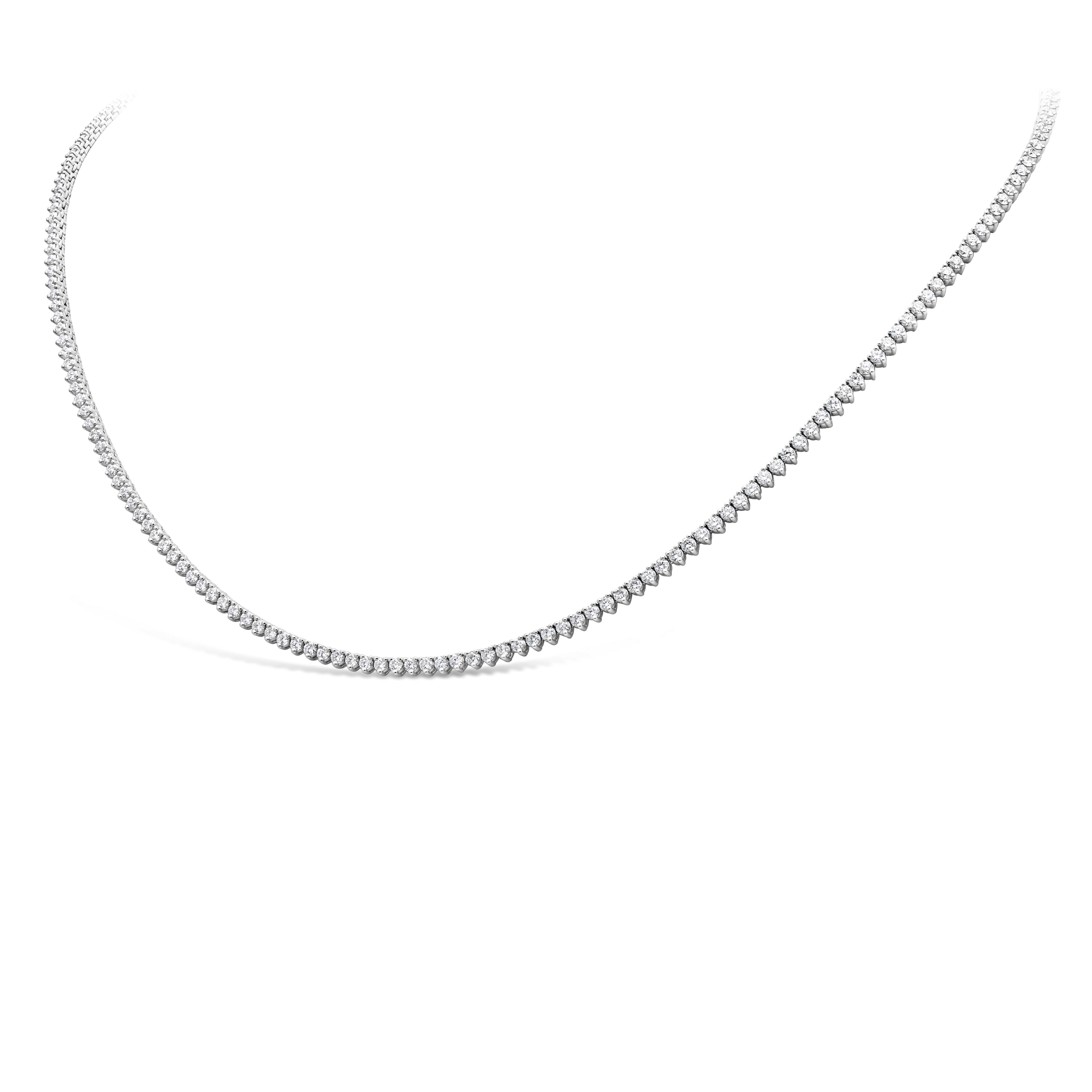 A classic tennis necklace style showcasing 215 brilliant round diamonds, set in a polished 18K White Gold. Diamonds weigh 4.03 carats total set in three prong and are approximately G color, VS clarity. 16 inches in Length.  

Roman Malakov is a