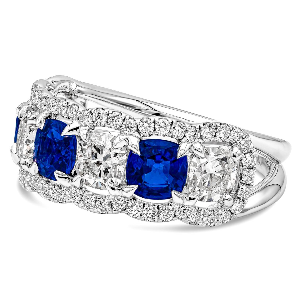 A marvelous seven stone fashion ring showcasing alternating cushion cut diamonds and blue sapphires each set in a claw four prong setting. Diamonds weighs 1.61 carats, GIA Certified E-F Color and VS in Clarity. Blue Sapphires weighs 1.98 carats